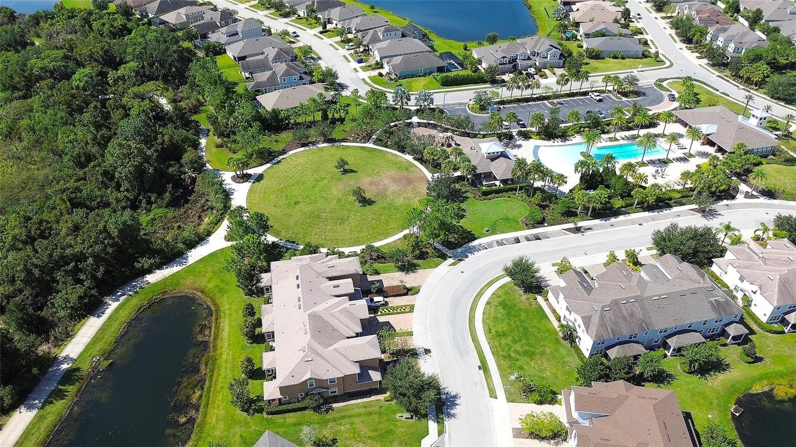 Aerial view of distance from the townhome to the amenities. - 12207 TRAILHEAD DR, BRADENTON