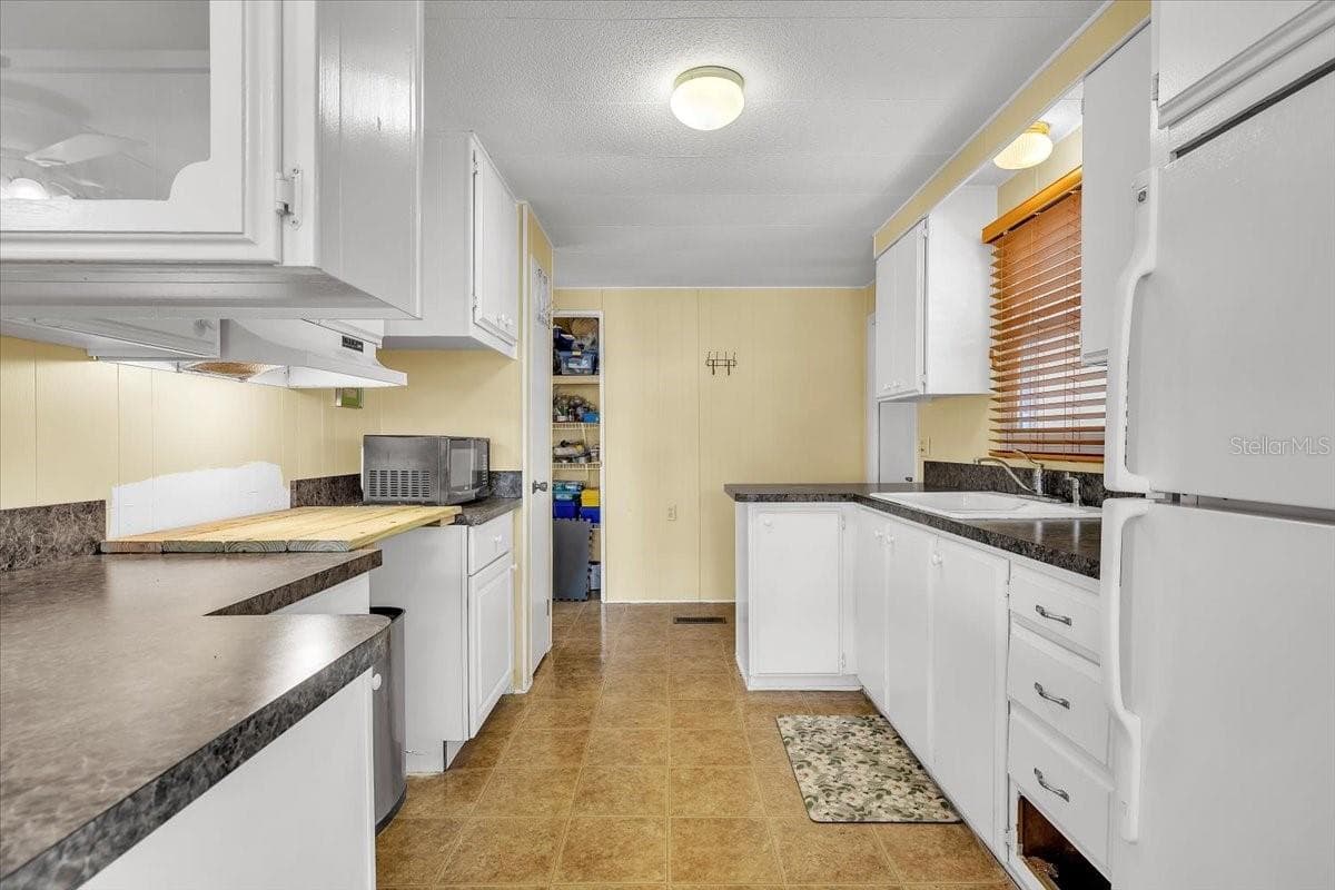 Mobile Home at 24437 HARBORVIEW RD #27, PORT CHARLOTTE, photo 5 of 50