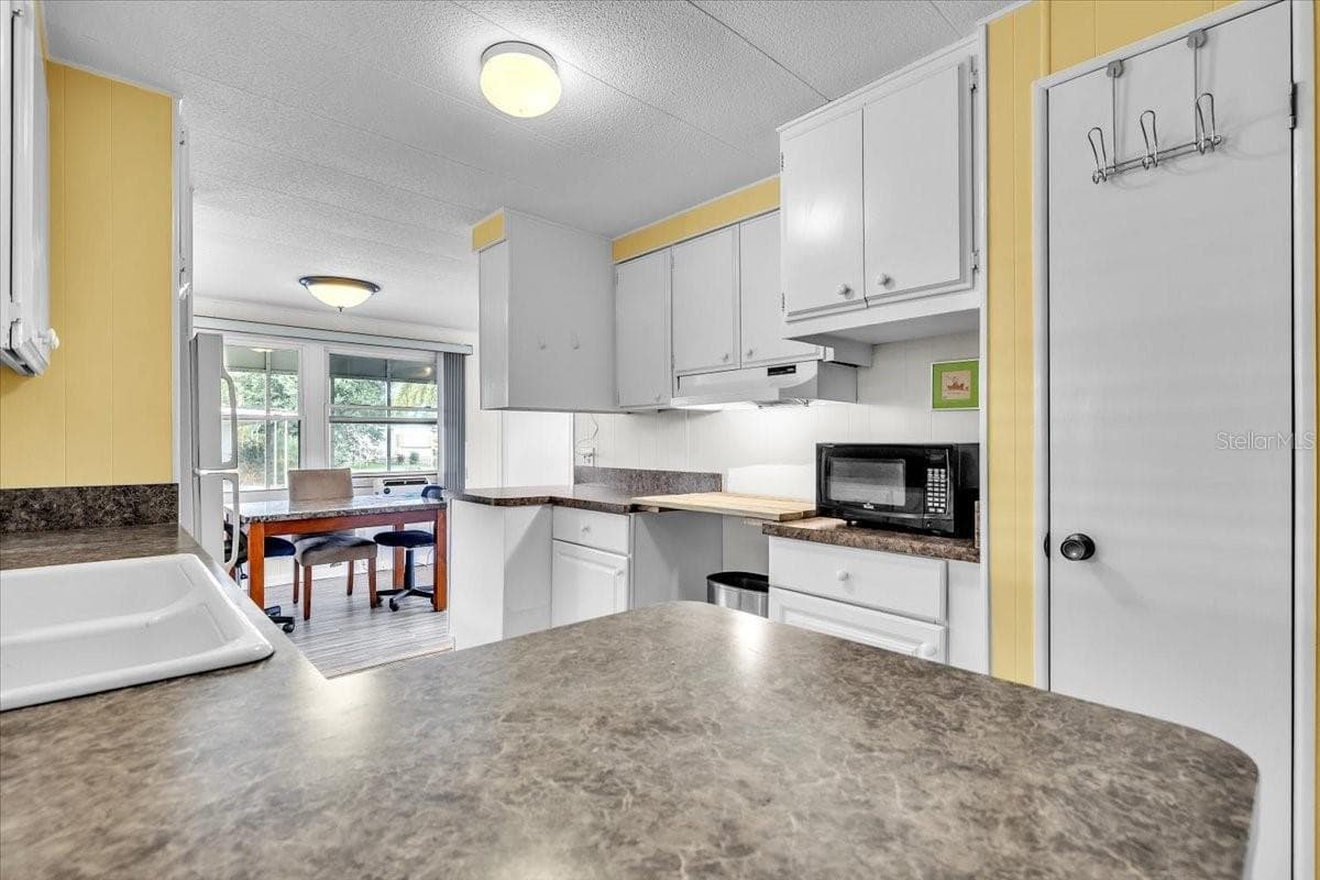 Mobile Home at 24437 HARBORVIEW RD #27, PORT CHARLOTTE, photo 8 of 50