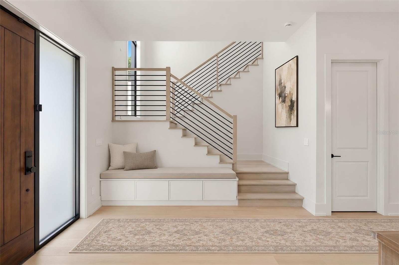 Clean lines of the modern stairway and storage closet to the right - 809 E CHURCH ST, ORLANDO