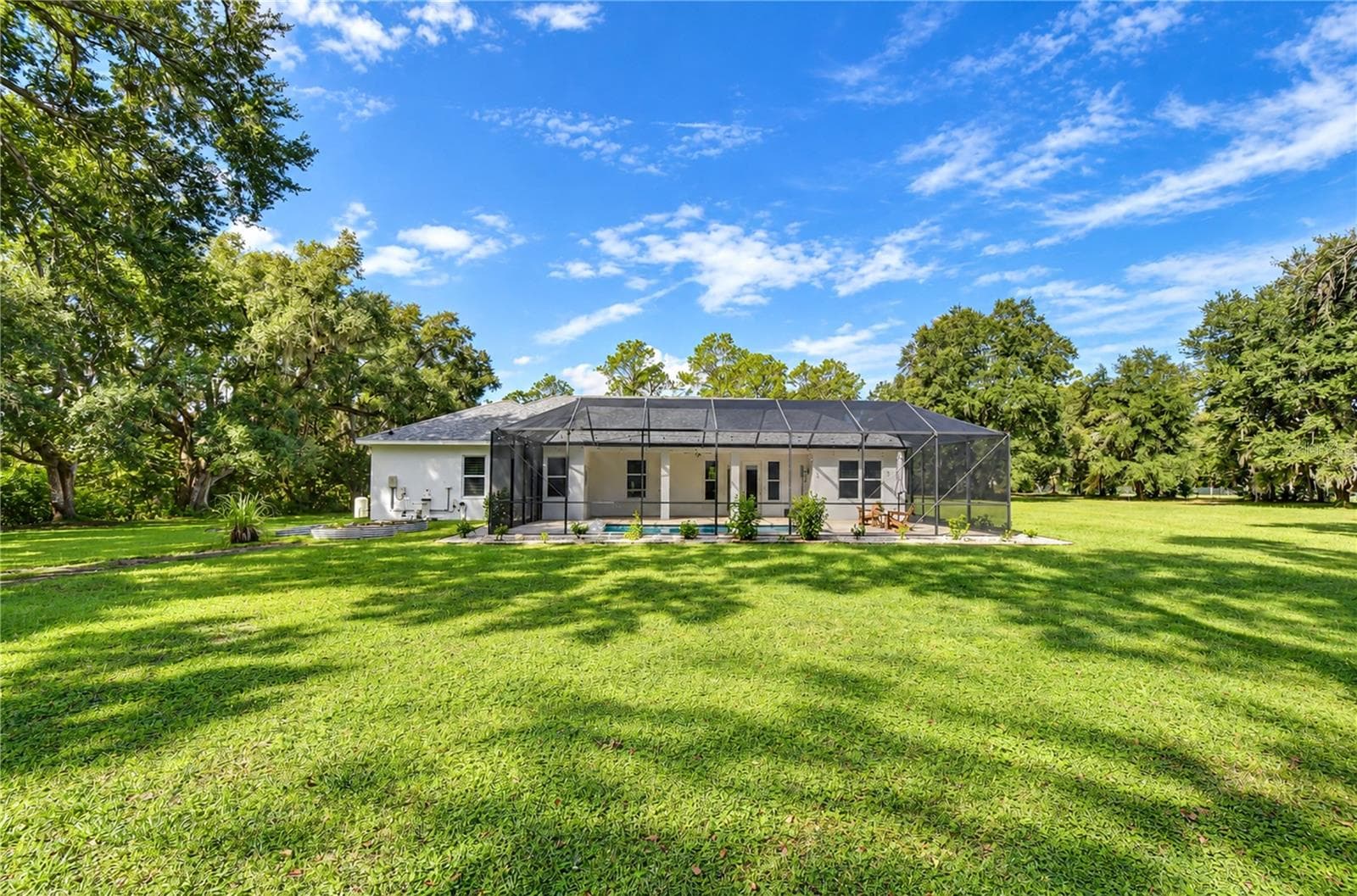 Rear View from backyard - 5746 FRONTIER DR, ZEPHYRHILLS
