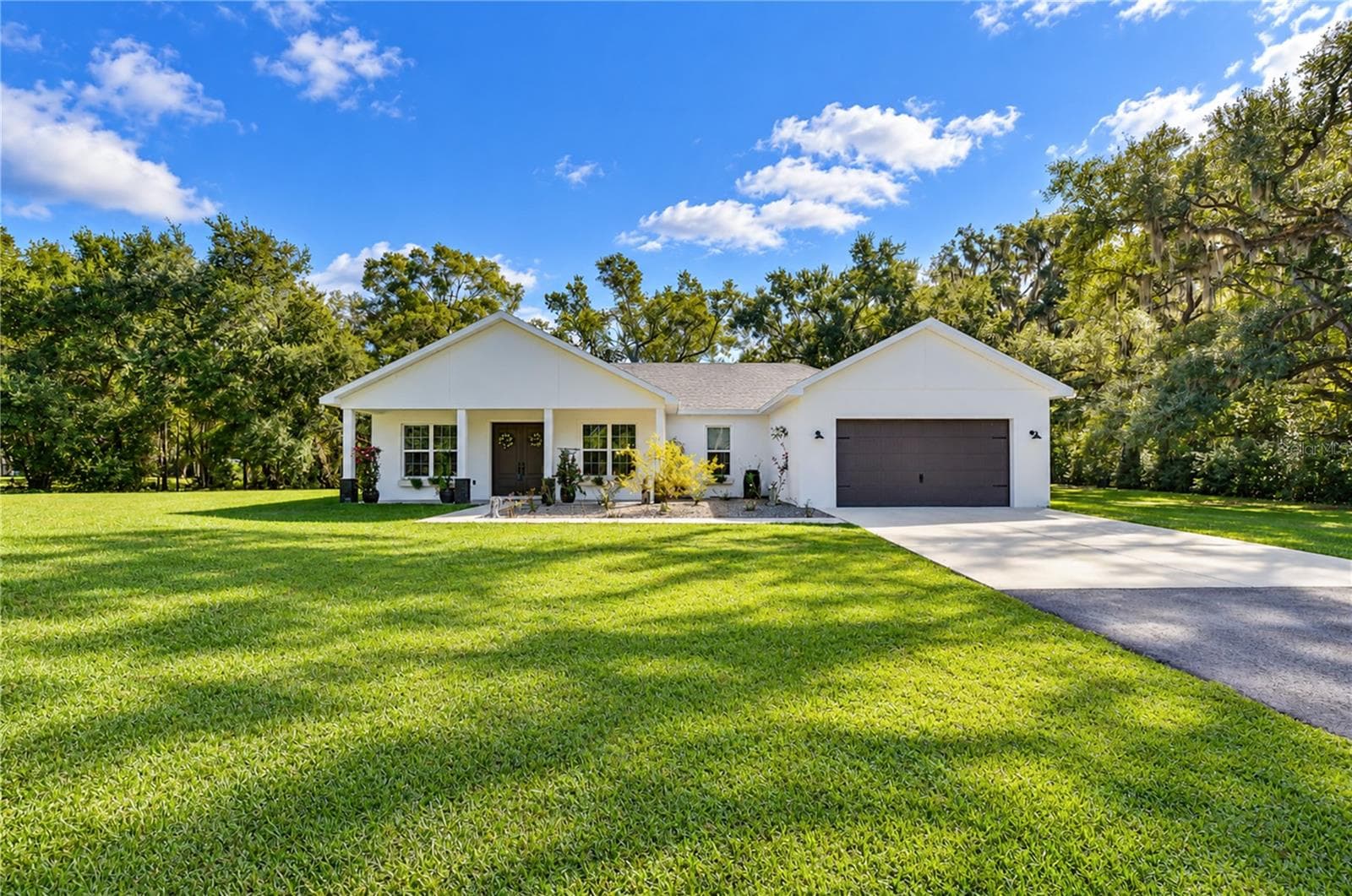 Front View of Home - 5746 FRONTIER DR, ZEPHYRHILLS