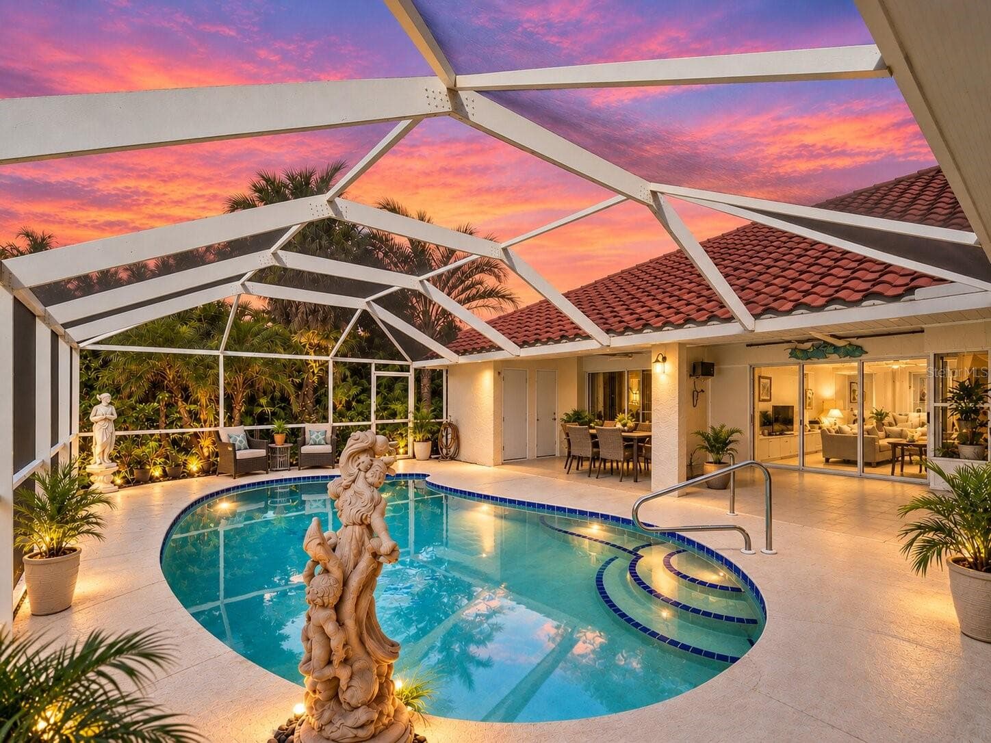 Pool_134TocopillaStreet_PuntaGorda_ScreenEnclosure_Twilight.jpg - 134 TOCOPILLA ST, PUNTA GORDA
