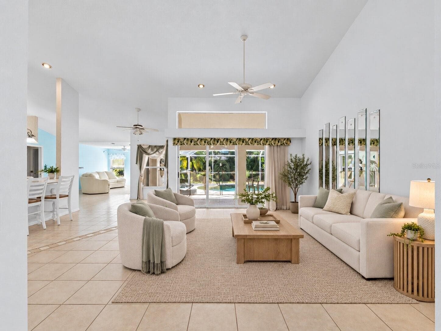 (Staged) GreatRoom_134TocopillaStreet_PuntaGorda_OpenConcept_SliderView.jpg - 134 TOCOPILLA ST, PUNTA GORDA