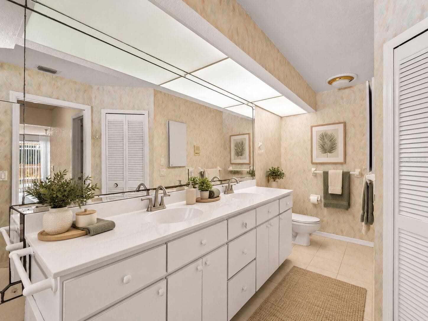 (Staged) Bath_134TocopillaStreet_PuntaGorda_DoubleVanity_Corner.jpg - 134 TOCOPILLA ST, PUNTA GORDA