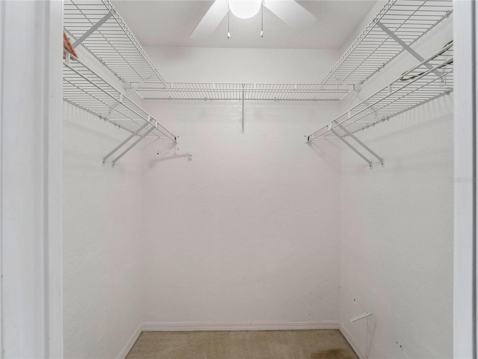 WalkInCloset_134TocopillaStreet_PuntaGorda_BuiltInShelving_Entry.jpg - 134 TOCOPILLA ST, PUNTA GORDA