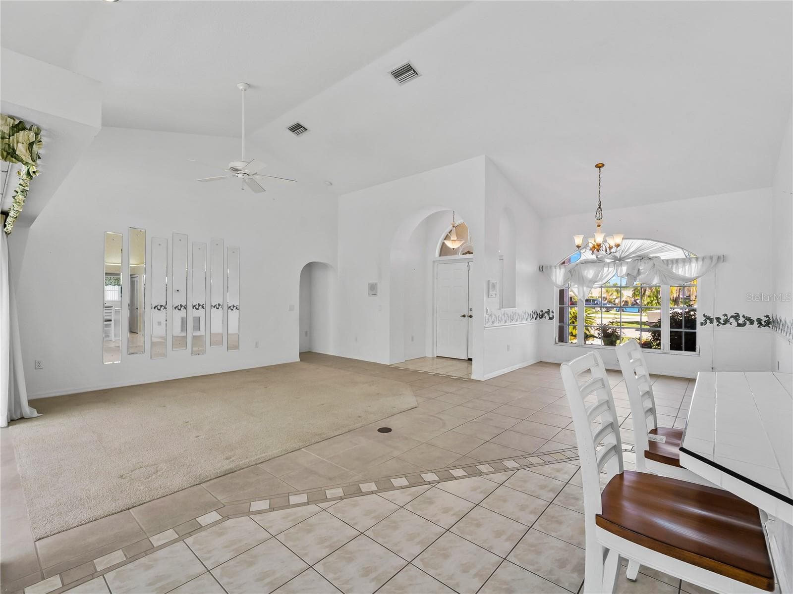 DiningLiving_134TocopillaStreet_PuntaGorda_OpenConcept_Corner.jpg - 134 TOCOPILLA ST, PUNTA GORDA