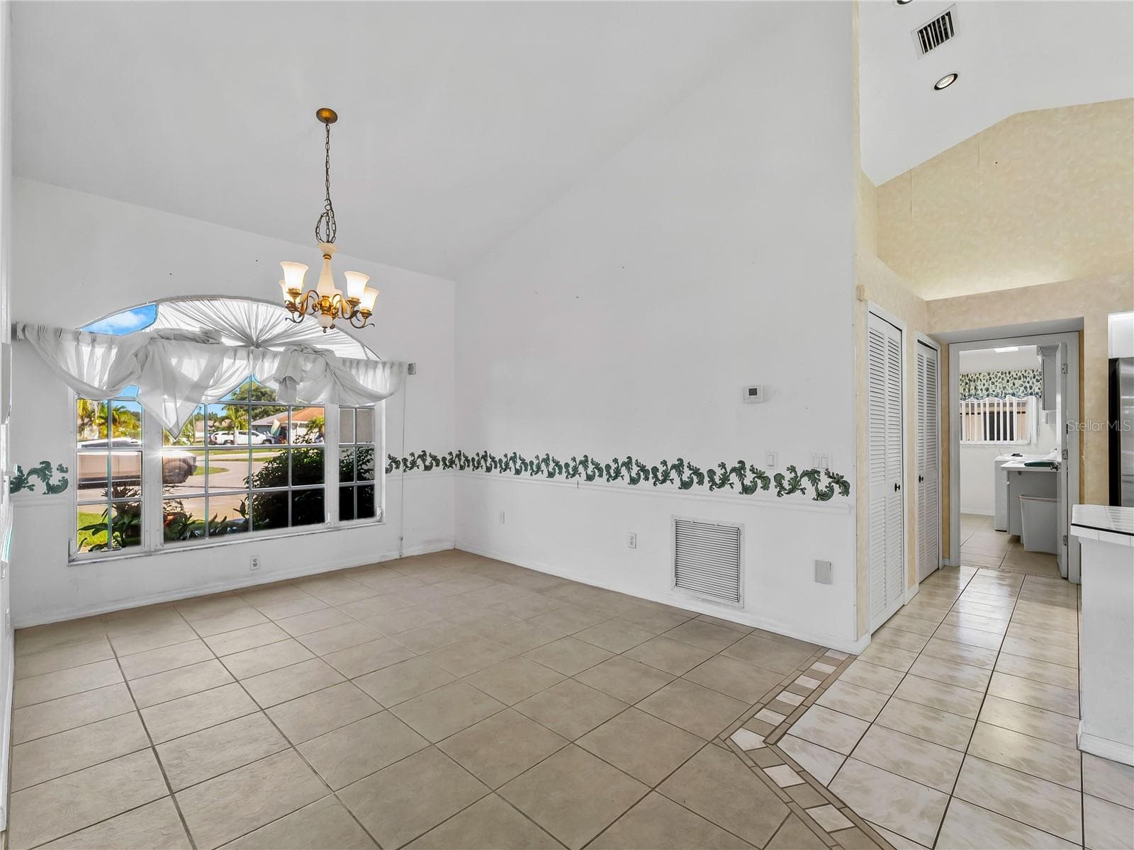 DiningRoom_134TocopillaStreet_PuntaGorda_OpenConcept_Corner.jpg - 134 TOCOPILLA ST, PUNTA GORDA