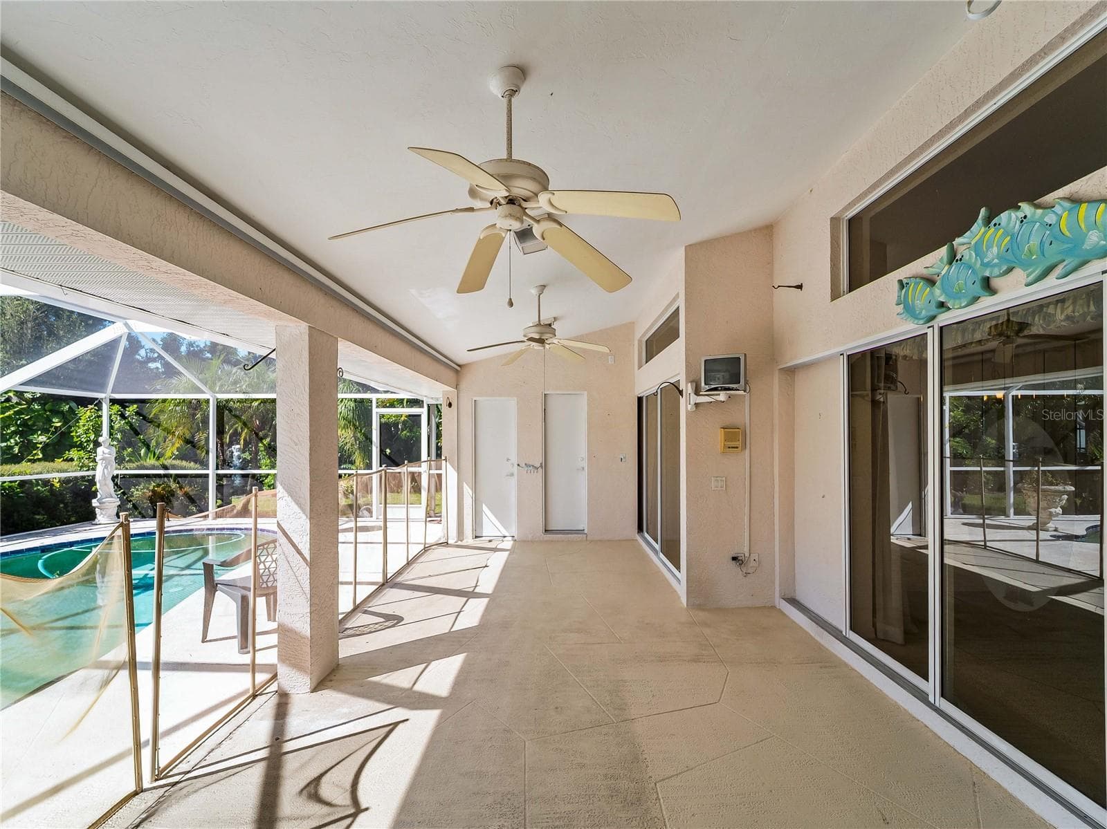 ScreenedLanai_134TocopillaStreet_PuntaGorda_ScreenEnclosure_LanaiView.jpg - 134 TOCOPILLA ST, PUNTA GORDA