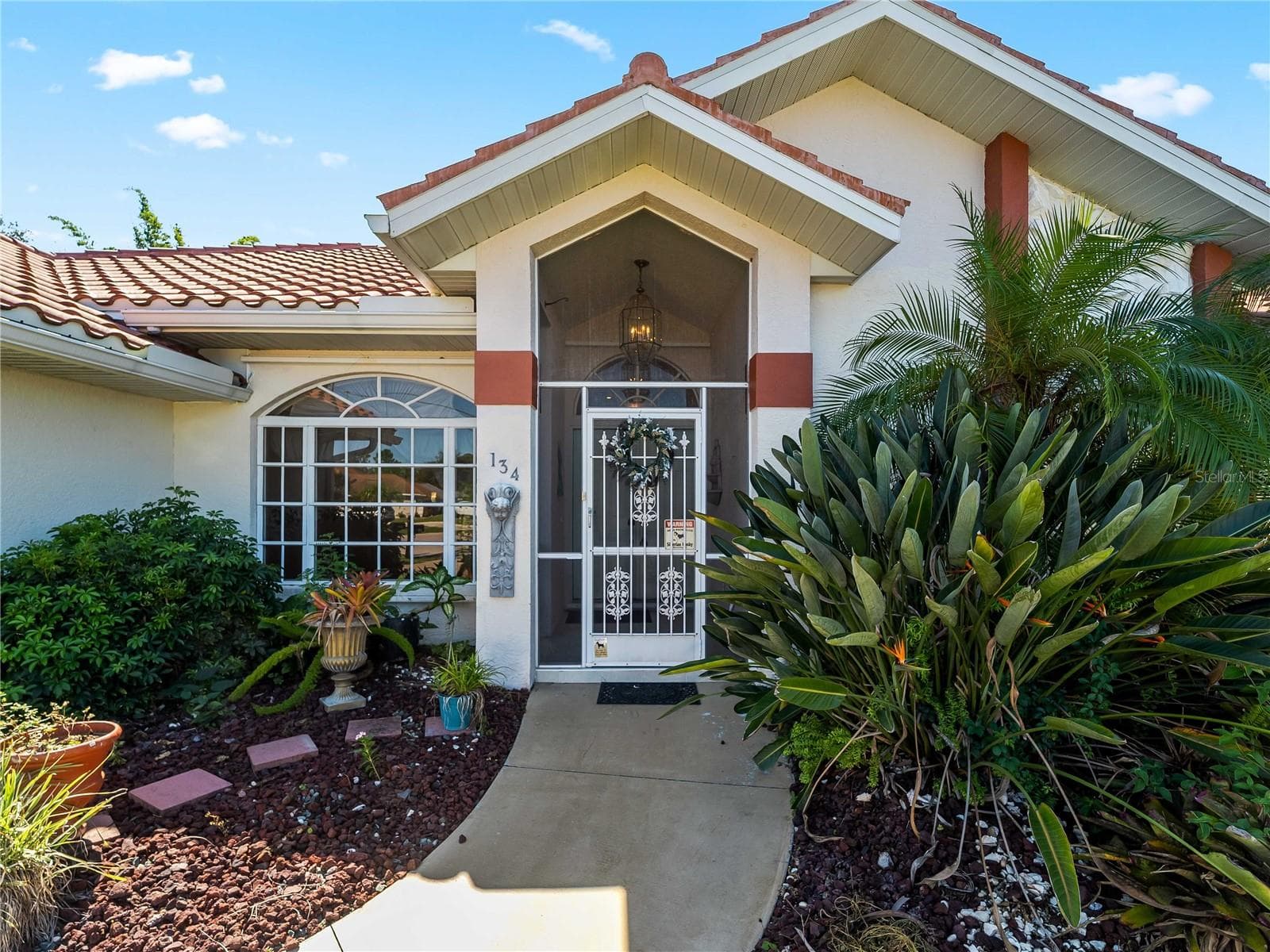 FrontExterior_134TocopillaStreet_PuntaGorda_Landscaped_Entry.jpg - 134 TOCOPILLA ST, PUNTA GORDA