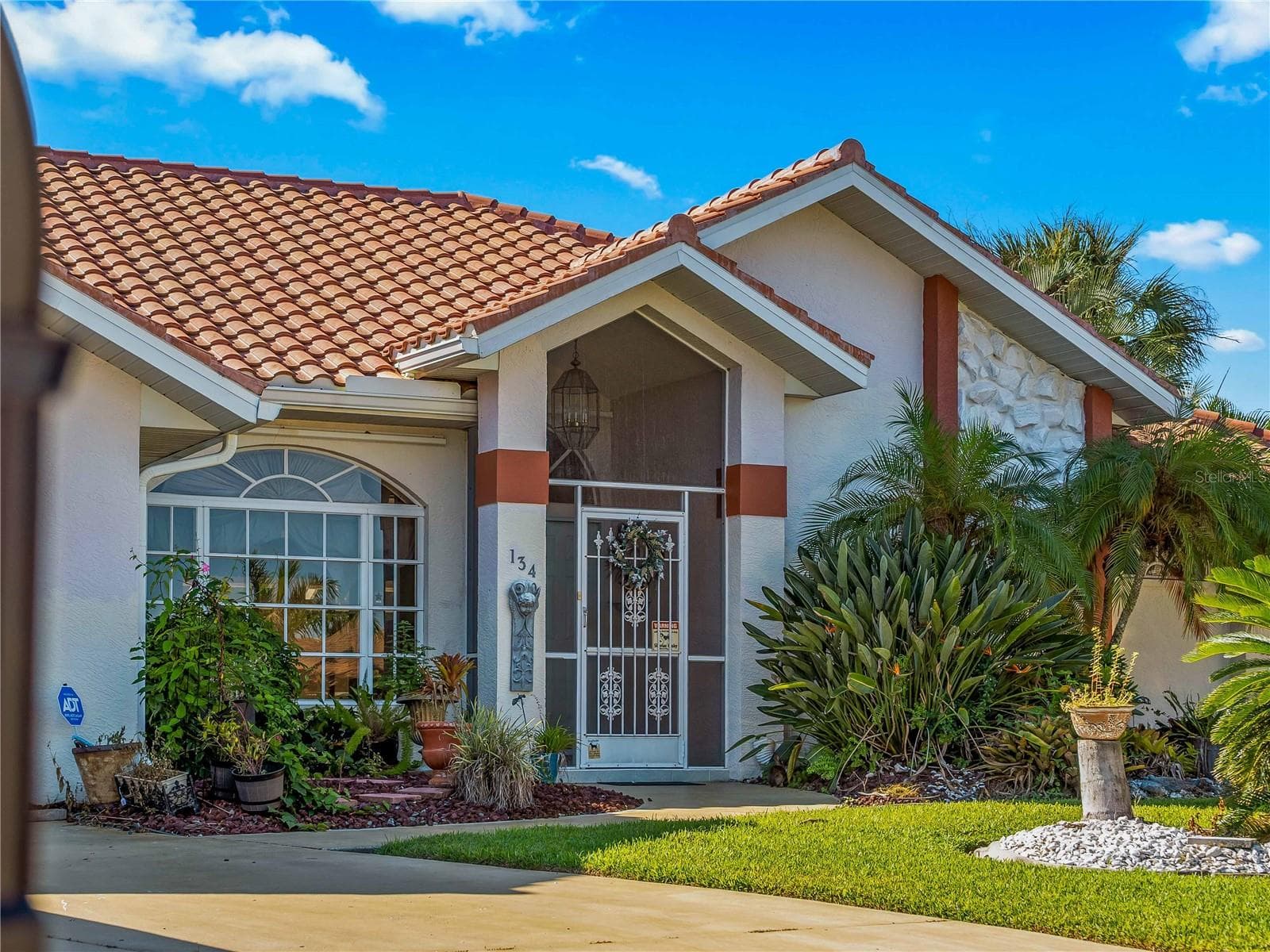 FrontExterior_134TocopillaStreet_PuntaGorda_Landscaped_Entry.jpg - 134 TOCOPILLA ST, PUNTA GORDA