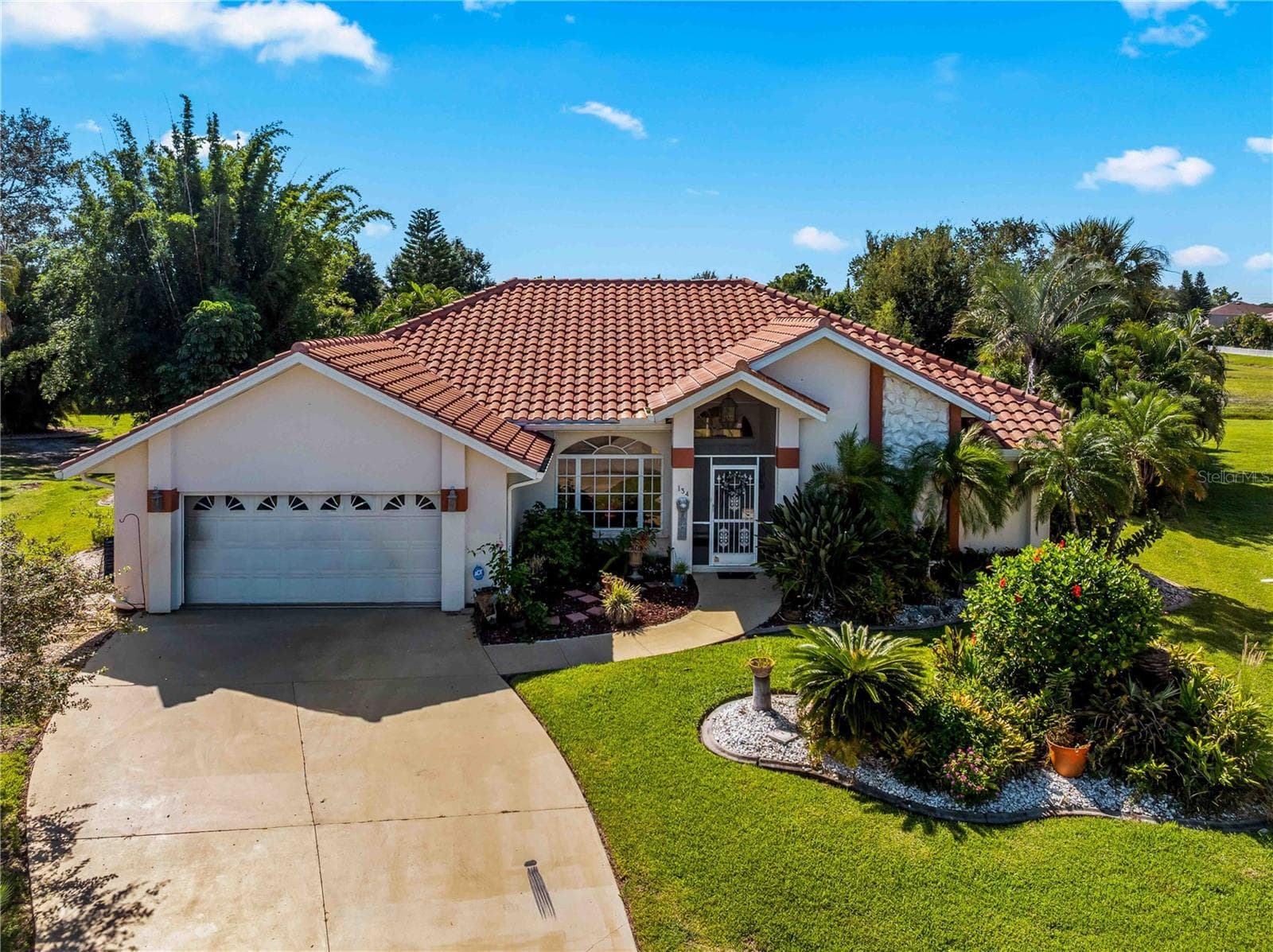 FrontExterior_134TocopillaStreet_PuntaGorda_CurbAppeal_Corner.jpg - 134 TOCOPILLA ST, PUNTA GORDA