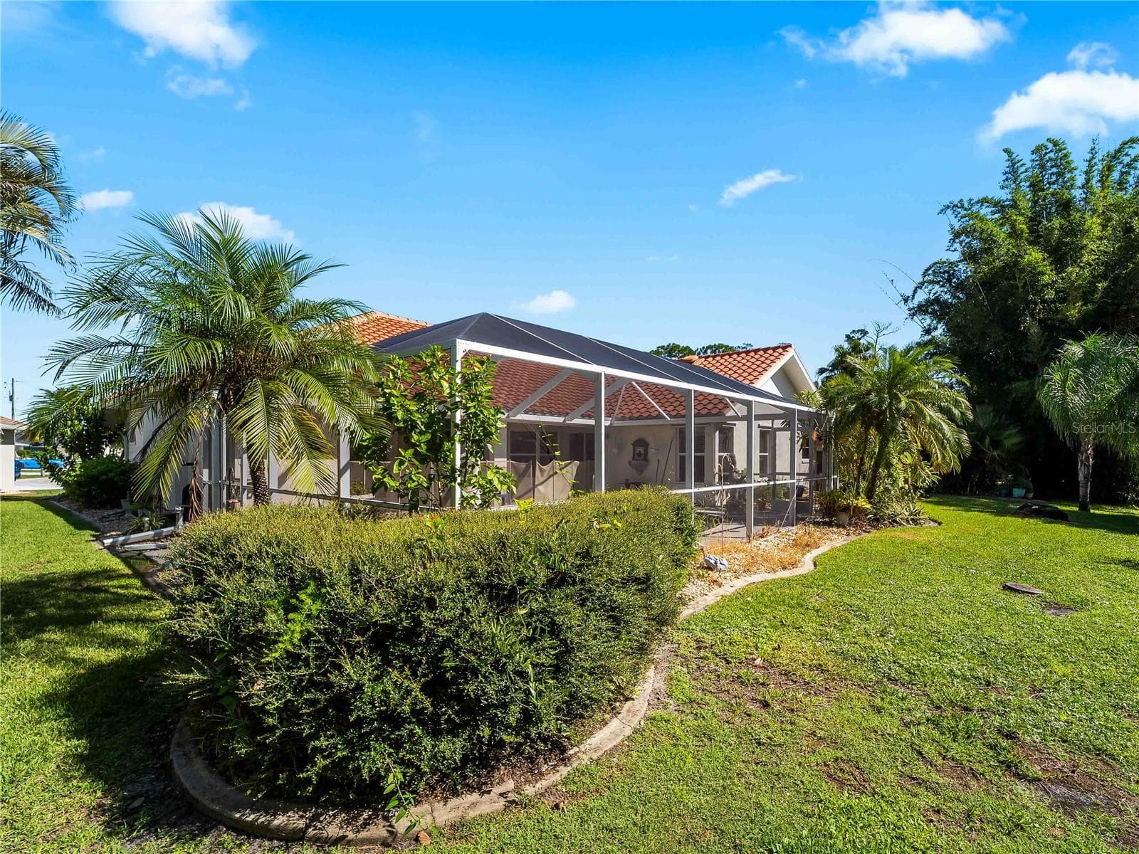 RearExterior_134TocopillaStreet_PuntaGorda_Landscaped_Daylight.jpg - 134 TOCOPILLA ST, PUNTA GORDA