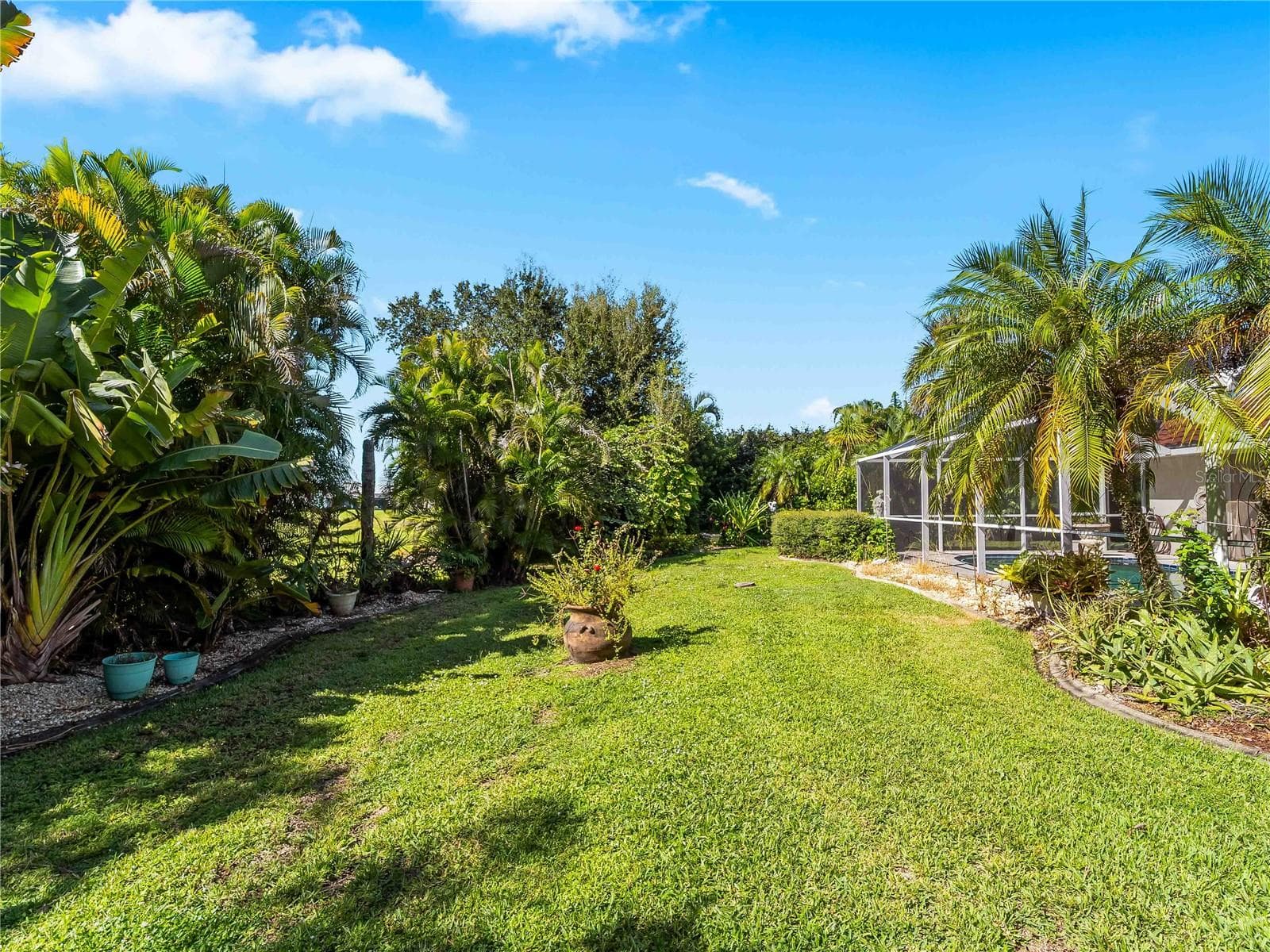 Backyard_134TocopillaStreet_PuntaGorda_SpaciousLawn_Daylight.jpg - 134 TOCOPILLA ST, PUNTA GORDA
