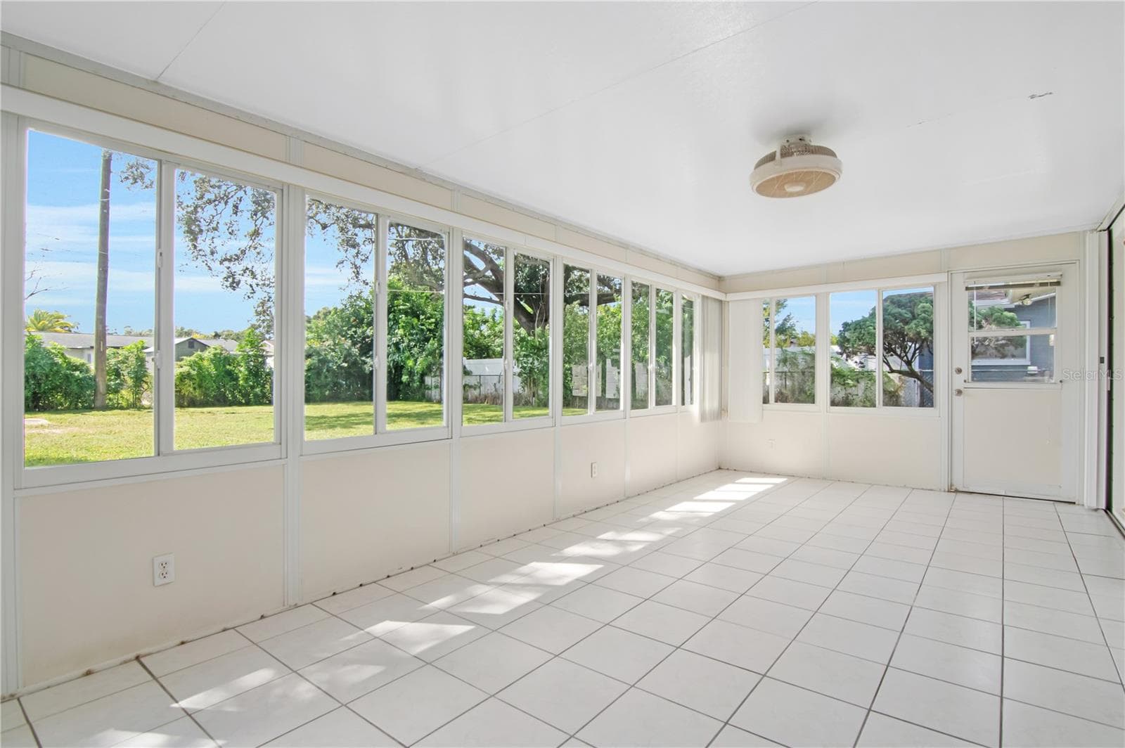 Enclosed sun room - 4330 20TH AVE N, ST PETERSBURG