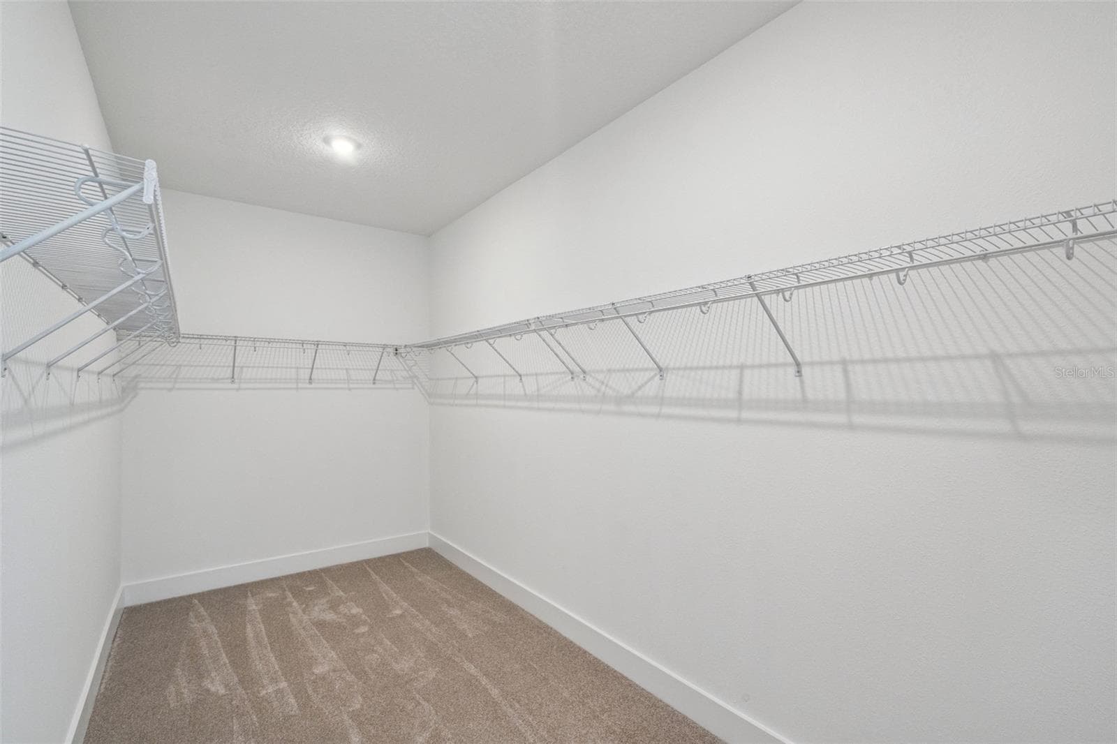 Representative photo primary closet - 17602 JAPONICA BLOOM DR, WINTER GARDEN