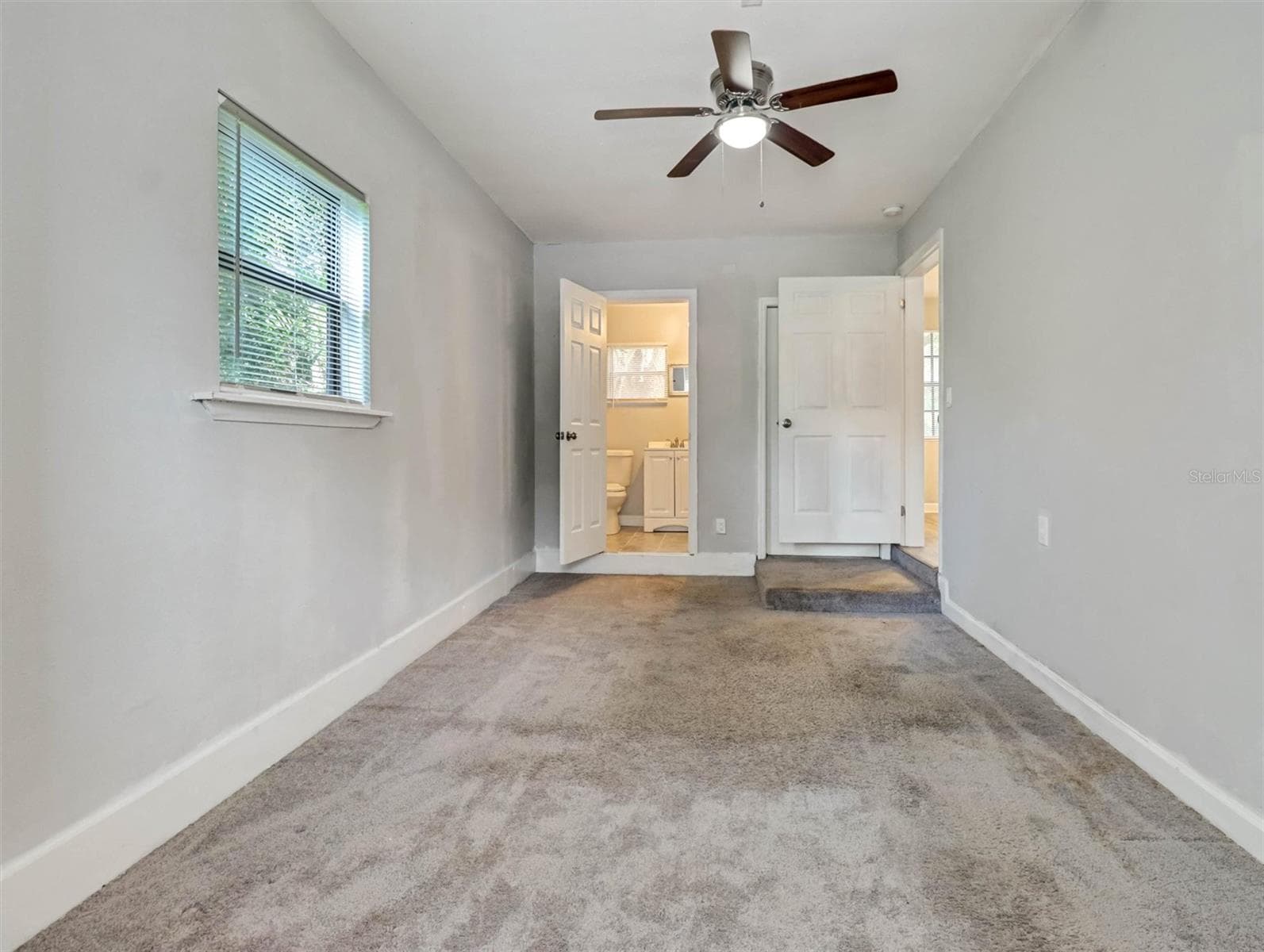 Primary Bedroom 2 with Half Bath and Backyard Acces - 1612 E NORTH BAY ST, TAMPA