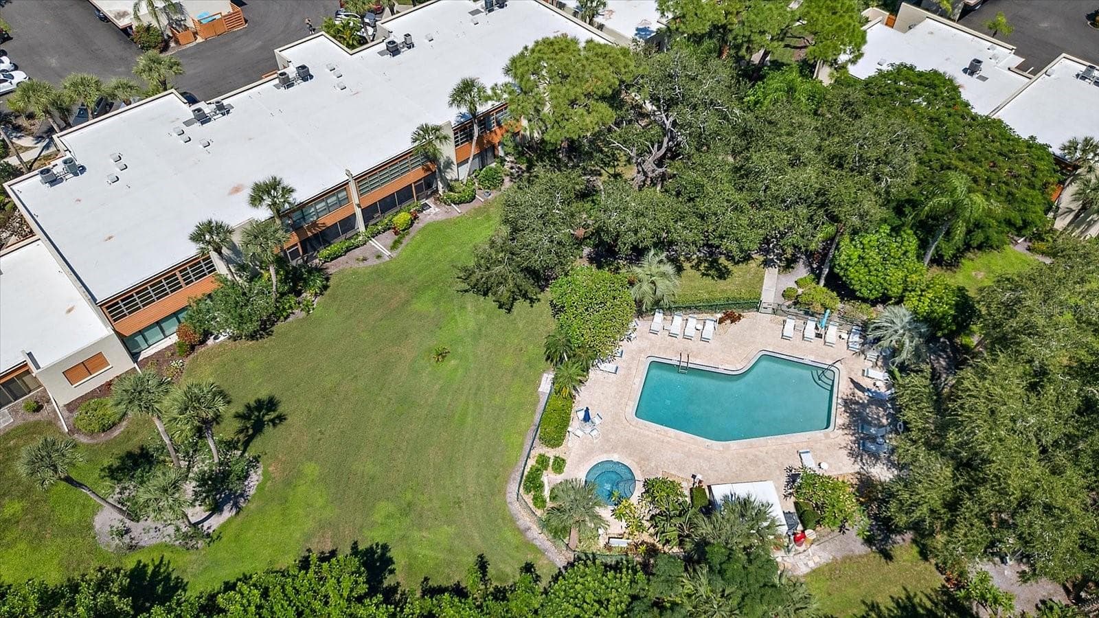 Pool right outside buiding - 211 PINENEEDLE DR #211, BRADENTON