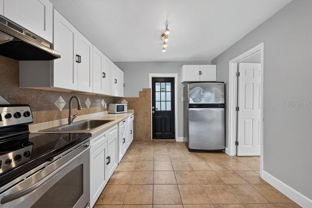 Single Family Residence at 725 STRAIN BLVD, LAKELAND, photo 14 of 78