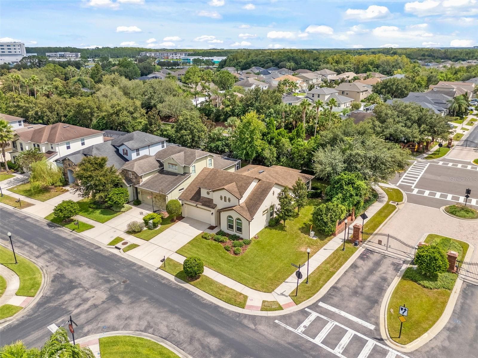 Aerial front right corner and entrance - 4432 VERMILLION SKY DR, WESLEY CHAPEL