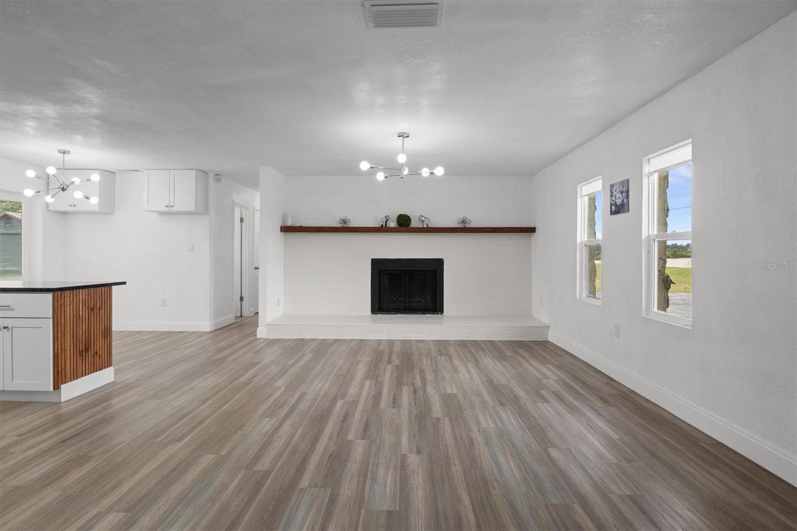 Living Room with fire place - 8812 OAKWOOD DR, LAKE WALES