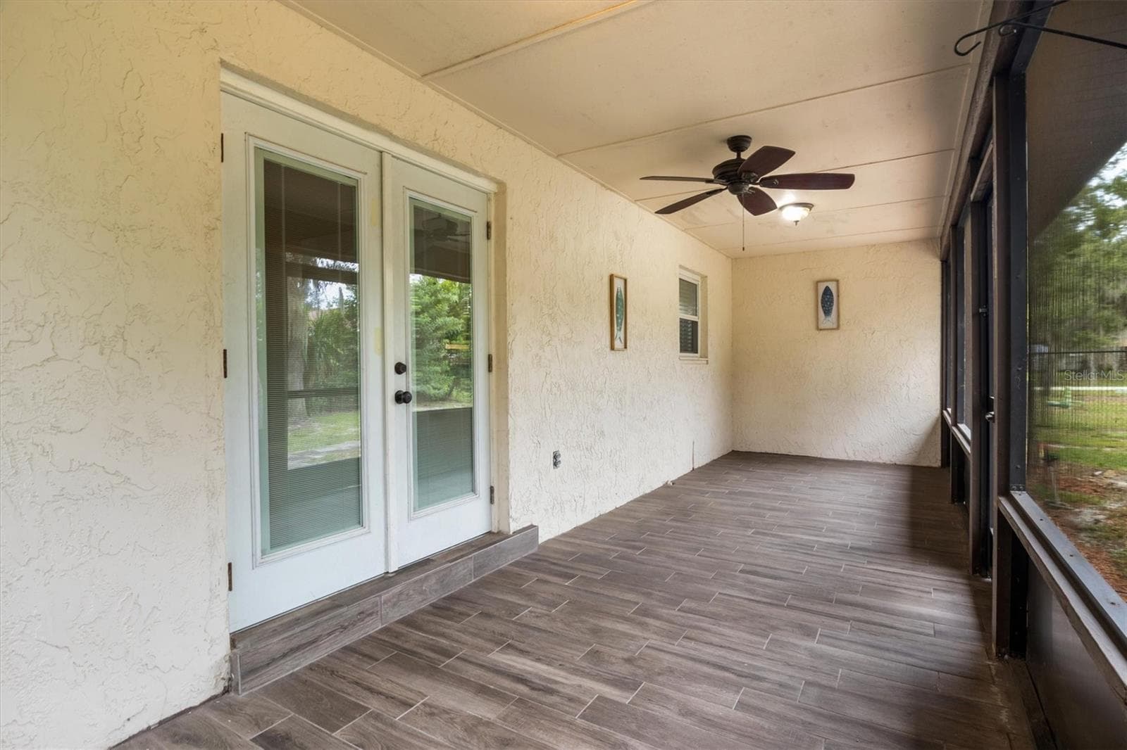 Screen Enclosed Patio - French Doors - 4302 SHADOW WOOD LN, WINTER HAVEN