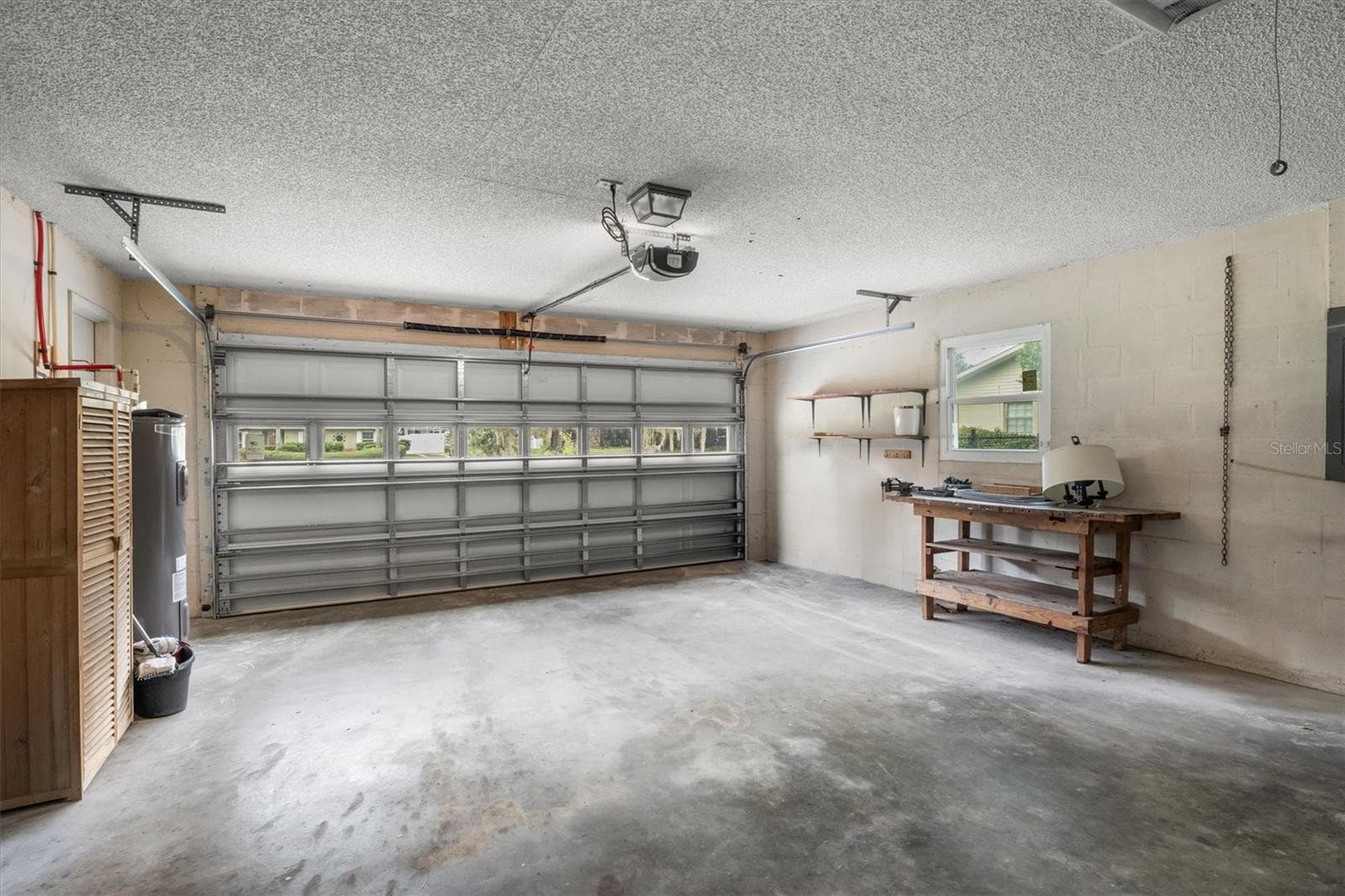 Garage - updated garage door - 4302 SHADOW WOOD LN, WINTER HAVEN