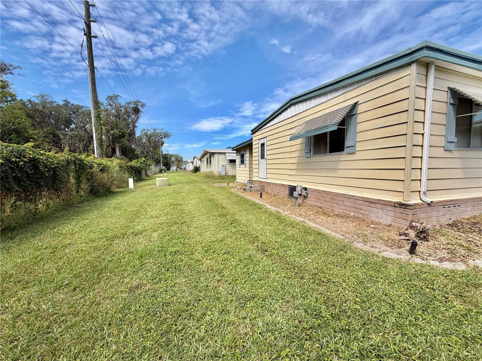 Mobile Home at 113 PYRACANTHA LN, LEESBURG, photo 52 of 52