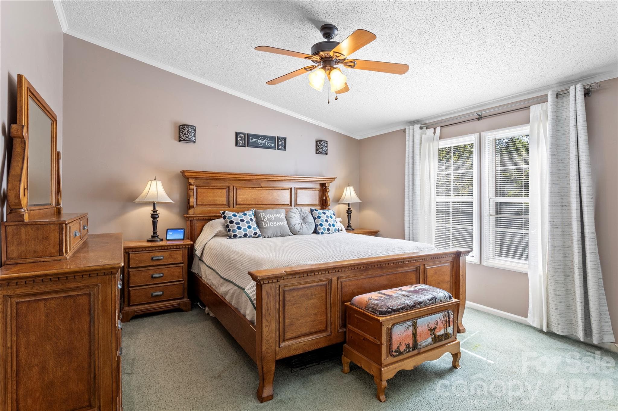 Primary bedroom, separated from the additional bedrooms by the split-bedroom layout. - 183 Gobbler Circle, Horse Shoe