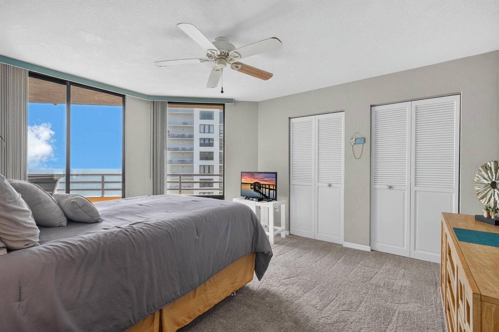 Bedroom with view of Halifax River - 3023 S ATLANTIC AVE #1106, DAYTONA BEACH SHORES
