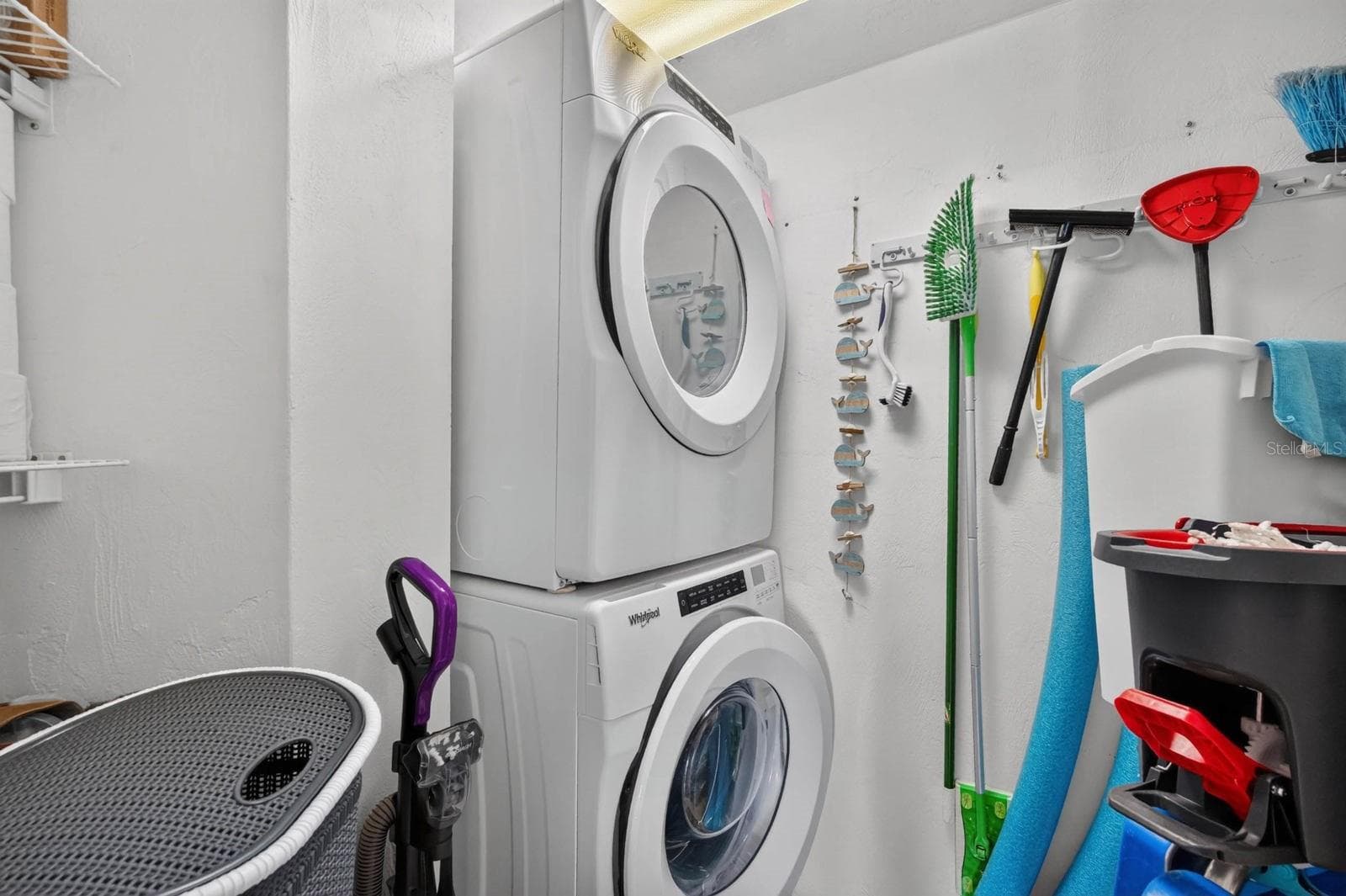 In Unit Laundry stacked washer and dryer - 3023 S ATLANTIC AVE #1106, DAYTONA BEACH SHORES