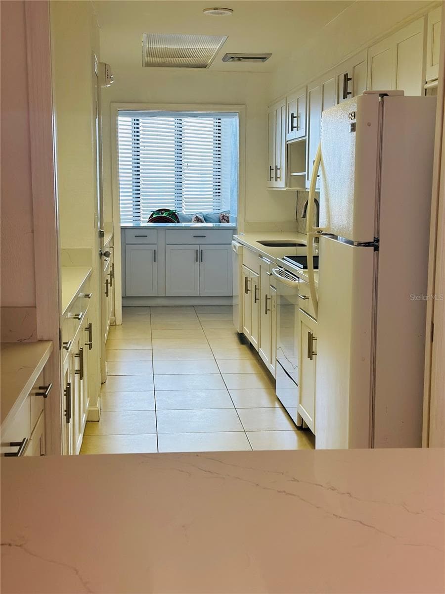 Community room full kitchen - 3023 S ATLANTIC AVE #1106, DAYTONA BEACH SHORES