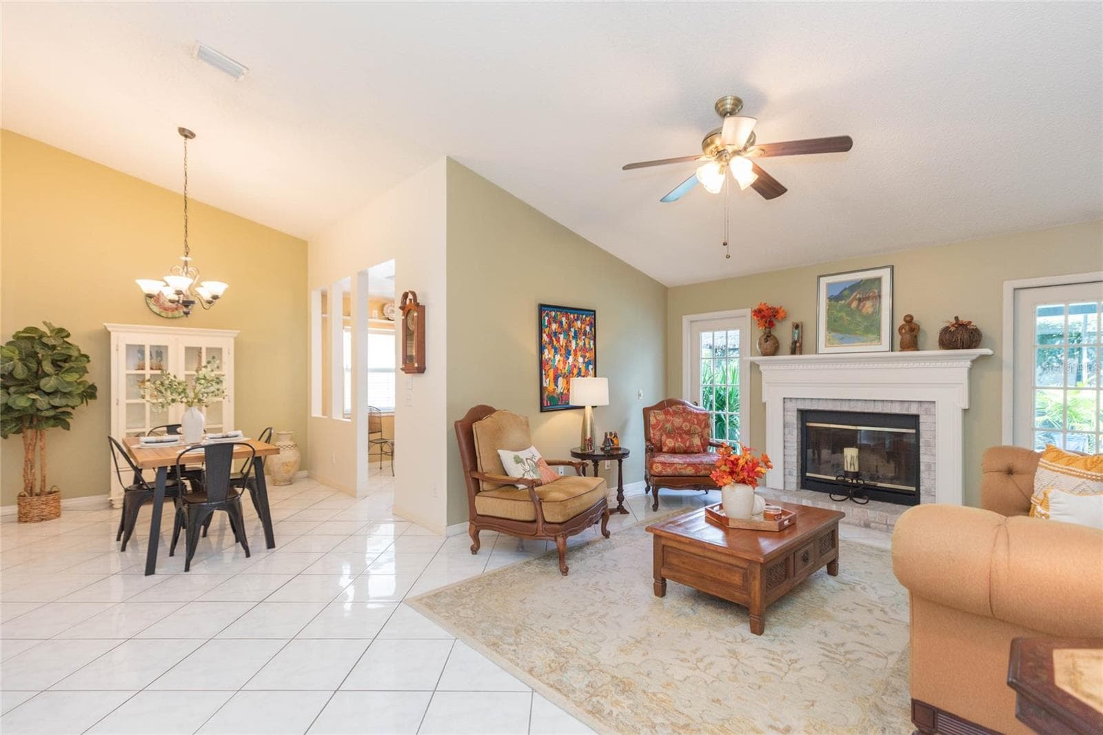Great Room w/wood burning fireplace & Dining Room - 4932 CYPRESS TRACE DR, TAMPA