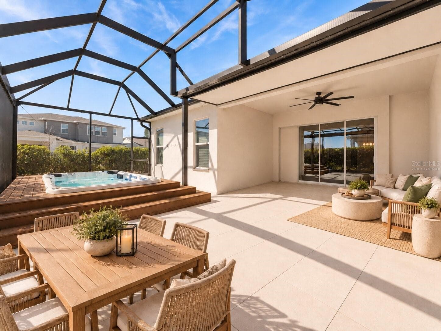 Virtually Staged! Screened outdoor living area perfect for relaxing or entertaining. - 19058 PLANETREE ST, ORLANDO