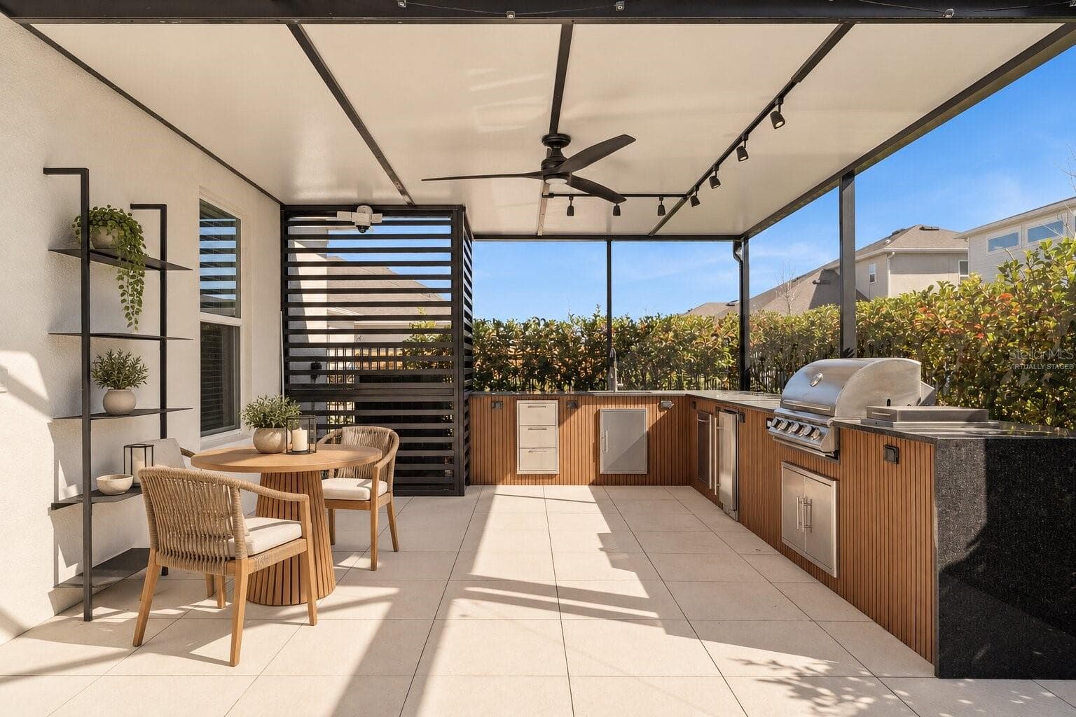 Virtually Staged! Covered outdoor living space perfect for enjoying Florida weather. - 19058 PLANETREE ST, ORLANDO