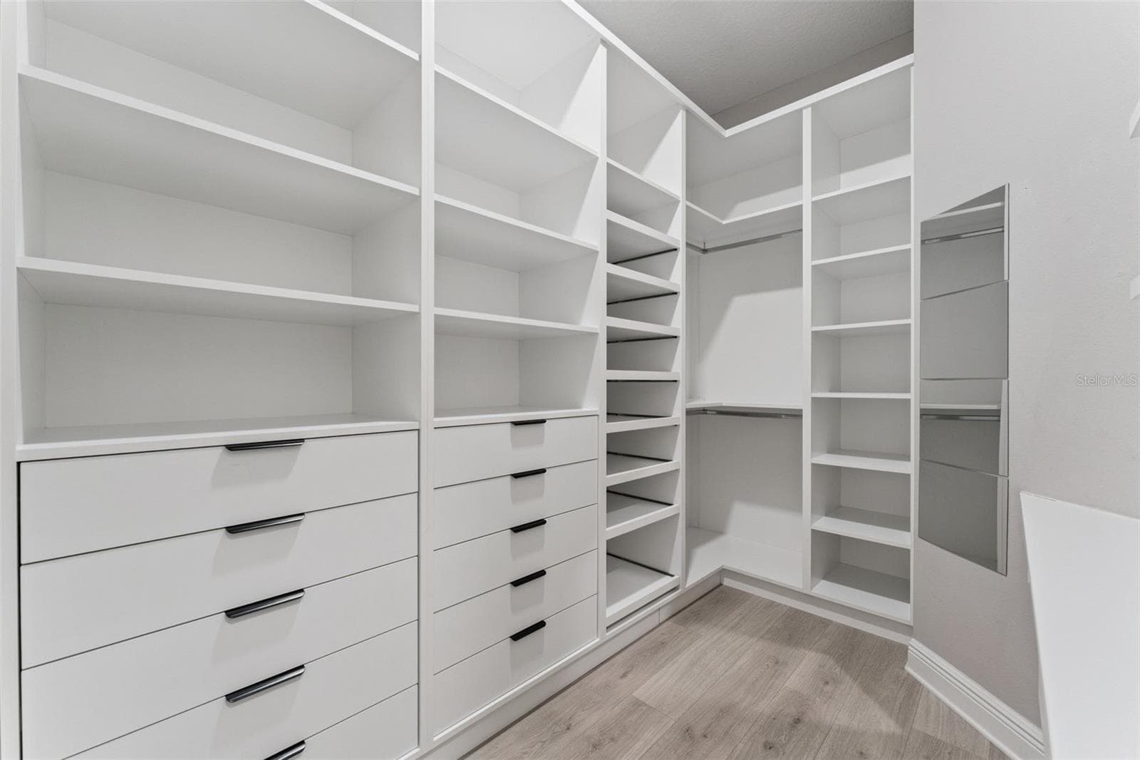 Large walk-in closet offering excellent storage and organization space. - 19058 PLANETREE ST, ORLANDO
