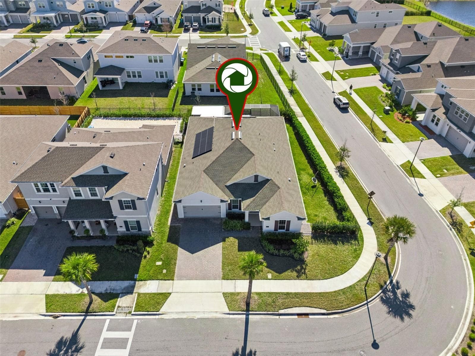 Aerial neighborhood view highlighting the home’s location within the community. - 19058 PLANETREE ST, ORLANDO