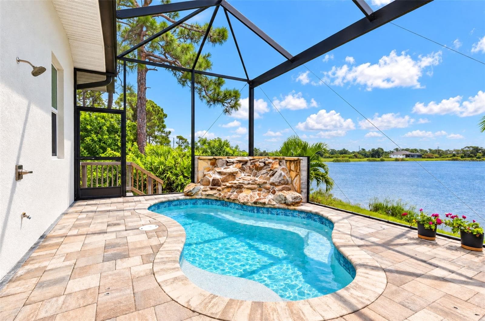 Waterfall into pool - 5 REEF CT, PLACIDA