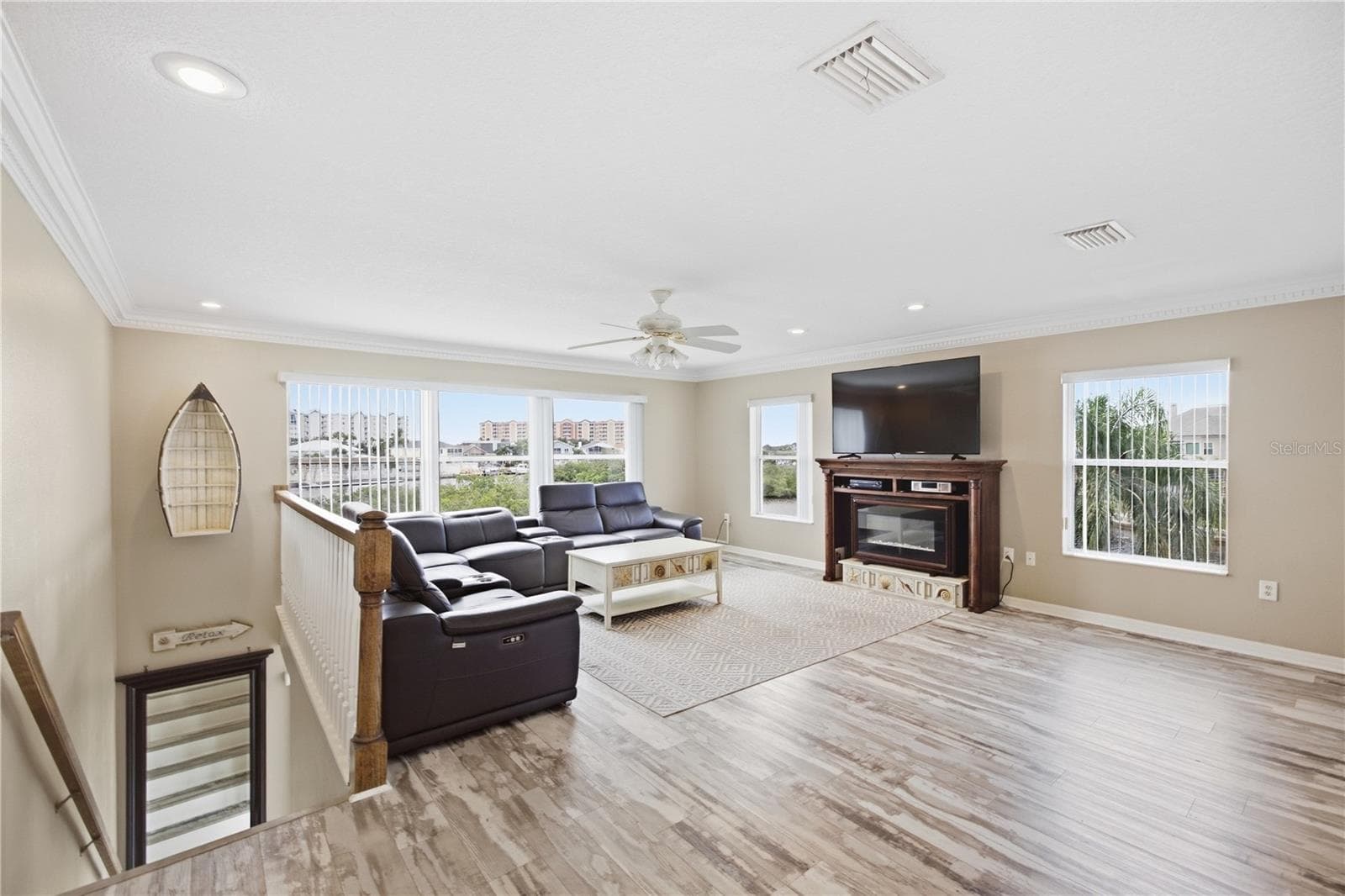 One of TWO Living Room/Den spaces in the home! TONS of natural light - 6244 SPOONBILL DR, NEW PORT RICHEY