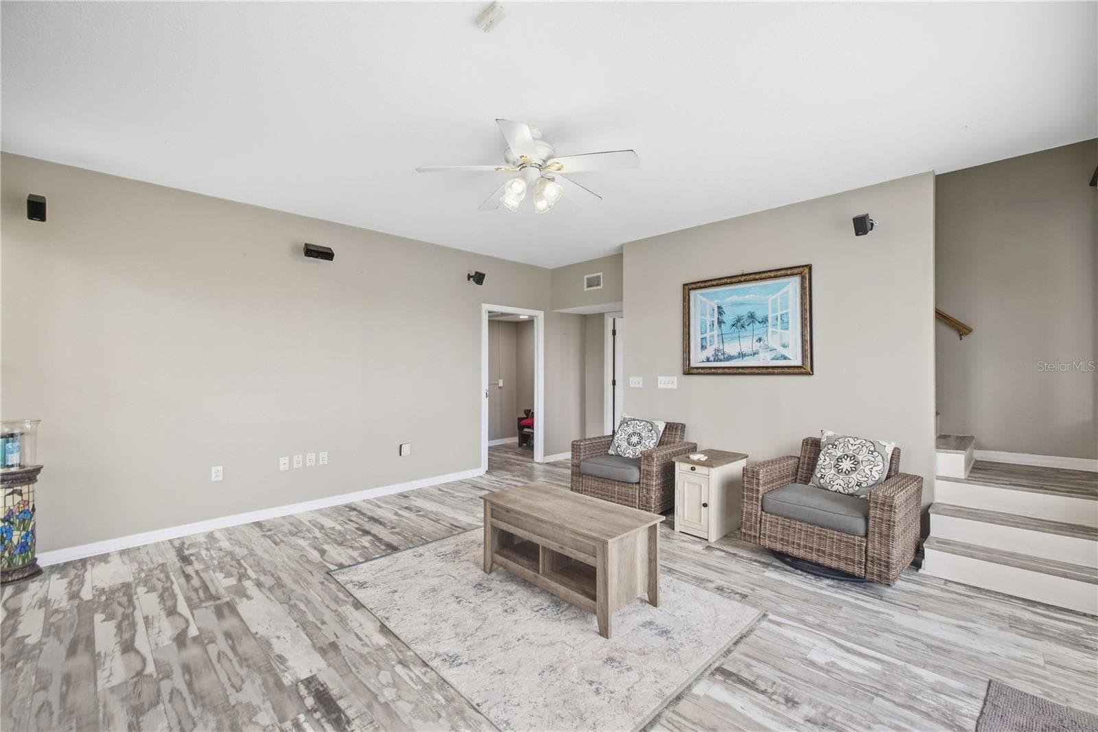 Den downstairs with wood burning fireplace nad additional entrance/exit. - 6244 SPOONBILL DR, NEW PORT RICHEY