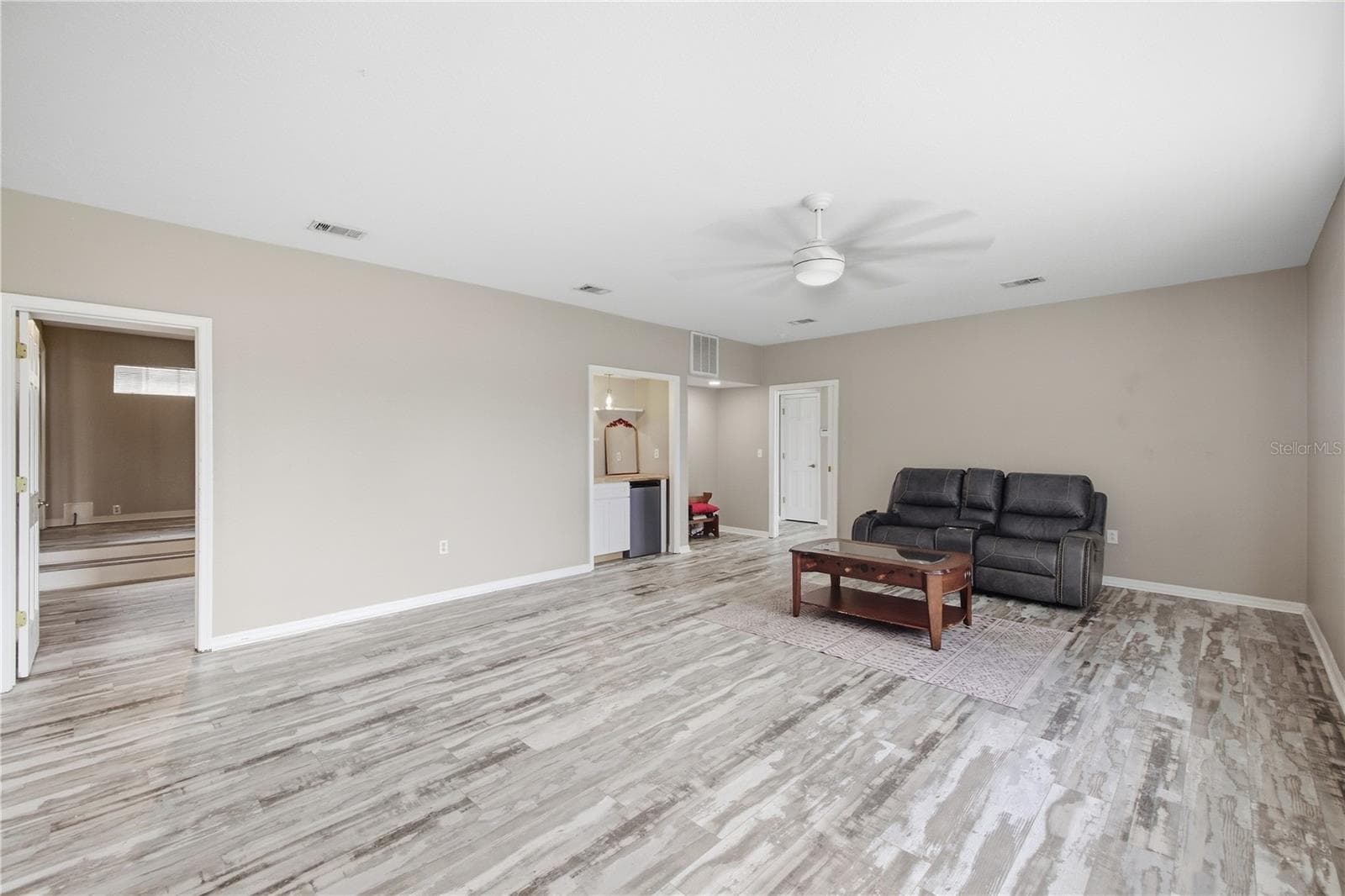 Huge Bonus Space / Secondary Living Room/Family room. Could be a living room for In-Law Suite designated space downstairs. - 6244 SPOONBILL DR, NEW PORT RICHEY