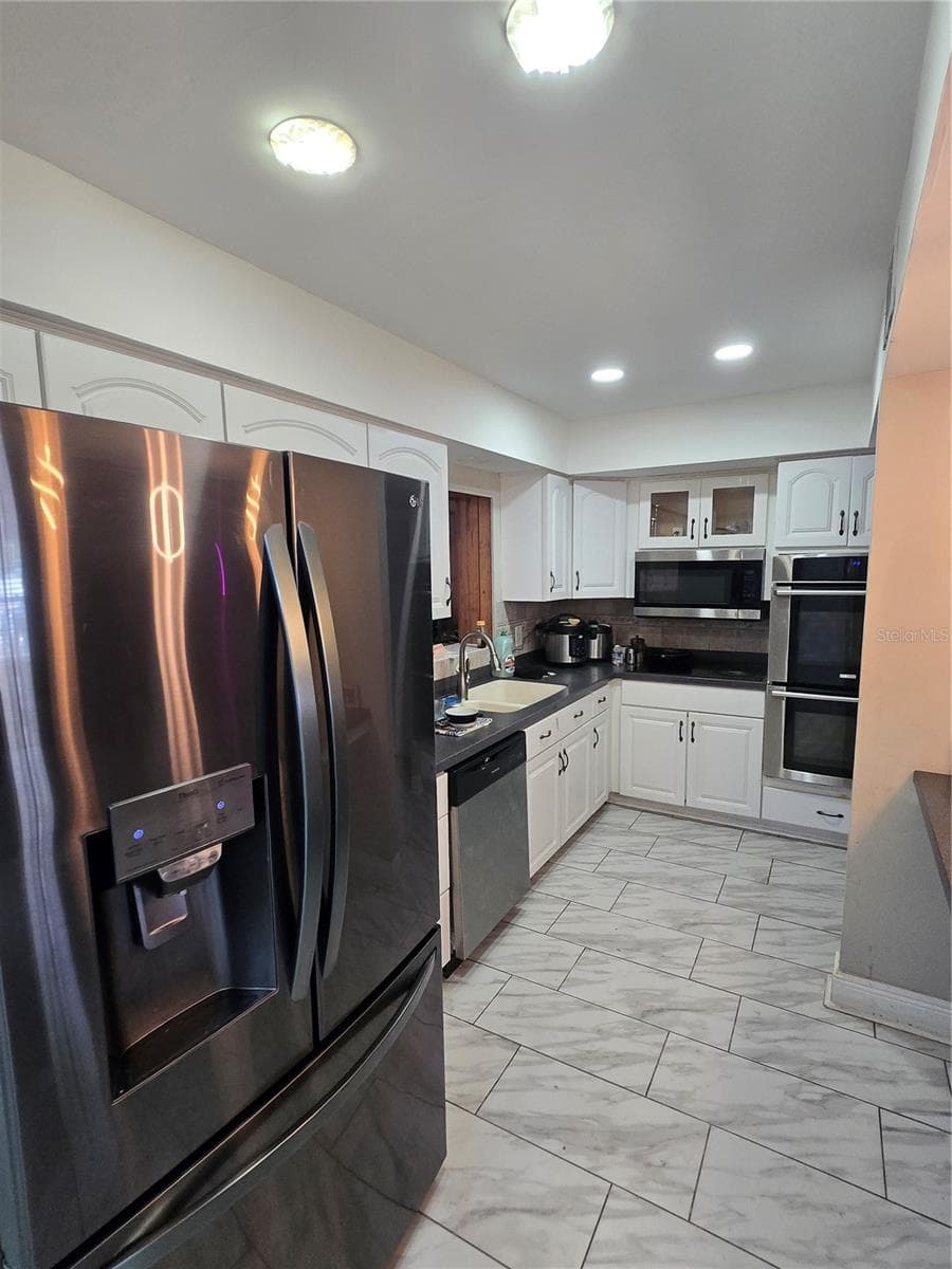 Single Family Residence at 7710 W HANNA AVE, TAMPA, photo 5 of 24