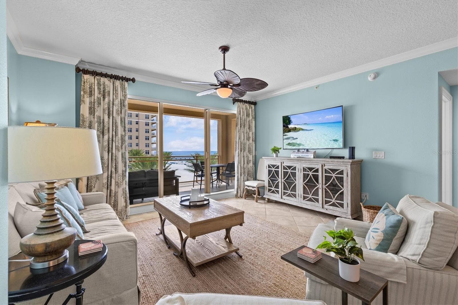 Bright, inviting living space with tile flooring and offered fully furnished. - 11 BAYMONT ST #703, CLEARWATER