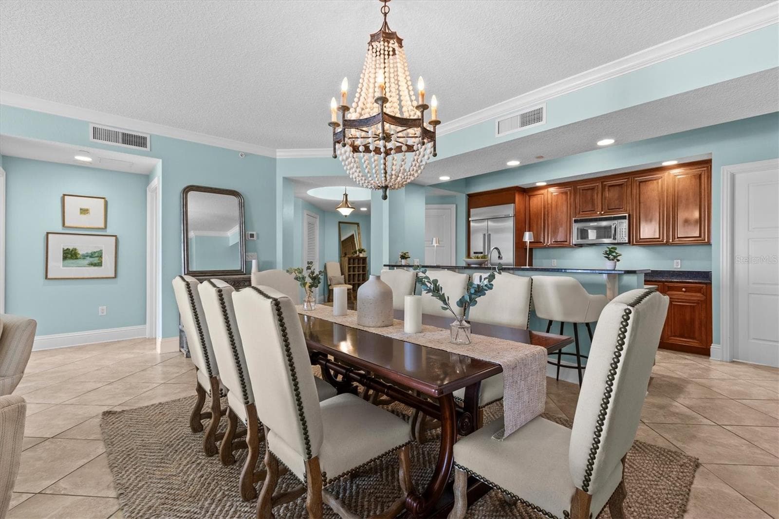 Open dining and kitchen area, perfect for relaxed coastal living - 11 BAYMONT ST #703, CLEARWATER