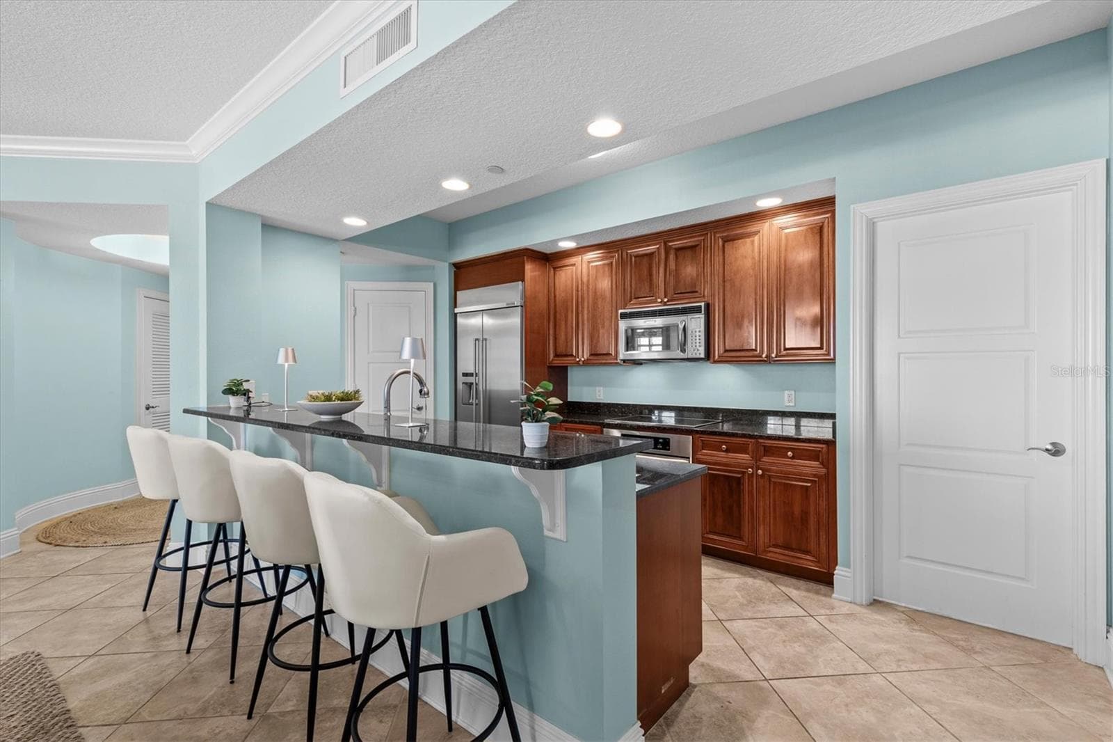 Fully stocked kitchen with generous storage and a walk-in pantry. - 11 BAYMONT ST #703, CLEARWATER