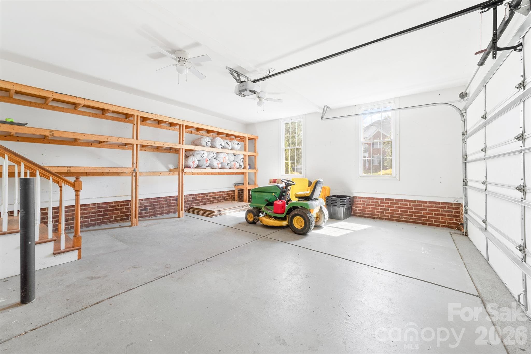 2 car garage with storage shelves - 4014 Belle Meade Circle, Belmont