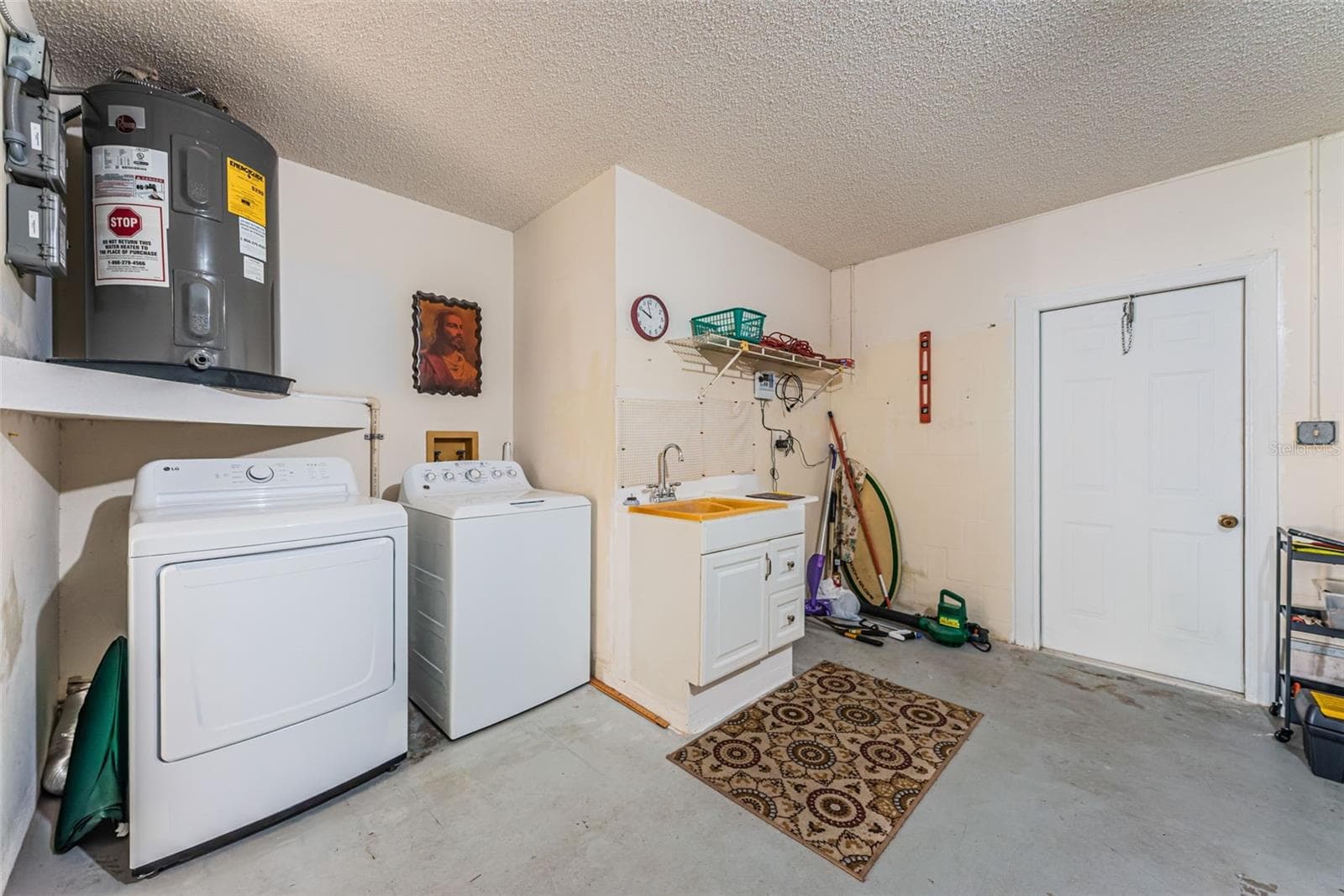 Laundry in Garage - Garage Service Door to Backyard - 812 HIGH POINT CT, TARPON SPRINGS