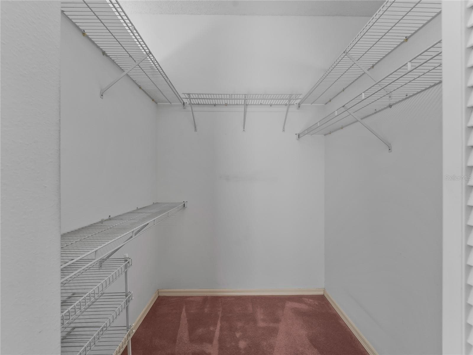 His Walk In Closet - 5121 PALM AIRE DR, SARASOTA
