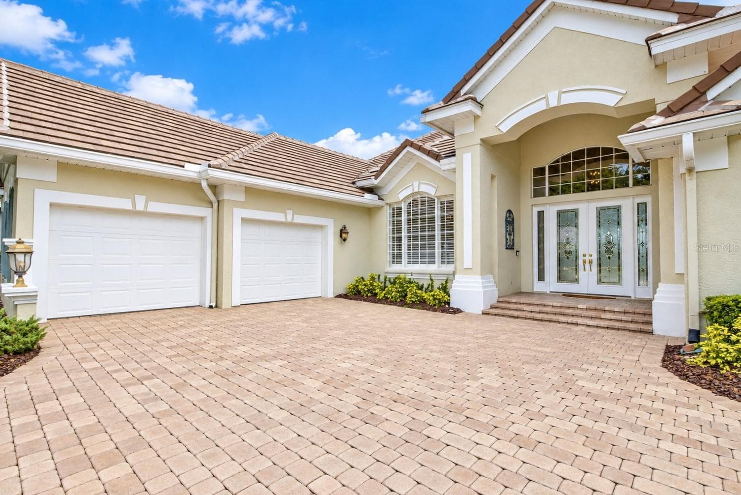 2 car oversized.  2 single car garage doors. - 269 SADDLEWORTH PL, LAKE MARY