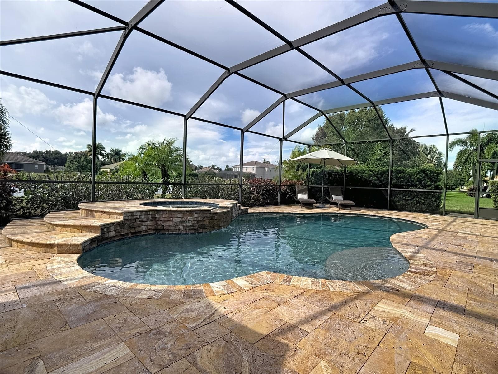 14,000 gallon Custom Gas Heated Salt Water Pool & Spa - 17014 E 2ND AVE, BRADENTON
